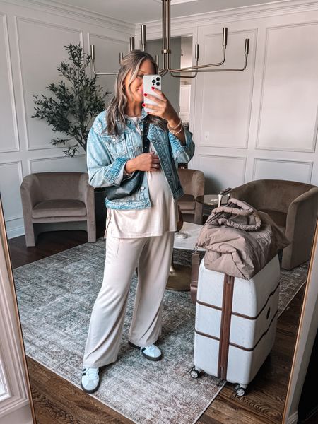 Amazon travel outfit idea at 30 weeks pregnant! This Amazon lounge set is SO comfortable I even wear it as pajamas! I did size up to a large for my 30 week bump and for extra comfort 

Sneakers fit true to size 
denim jacket I wear a medium 

#LTKBump #LTKFindsUnder50 #LTKTravel