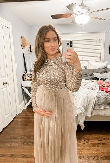 Wearing size 10 - sleeves were a bit snug (I would size up if this is something you are worried about)

Wedding guest dress - baby shower dress - bump style -
Maternity dress - pregnancy

#LTKwedding #LTKbump