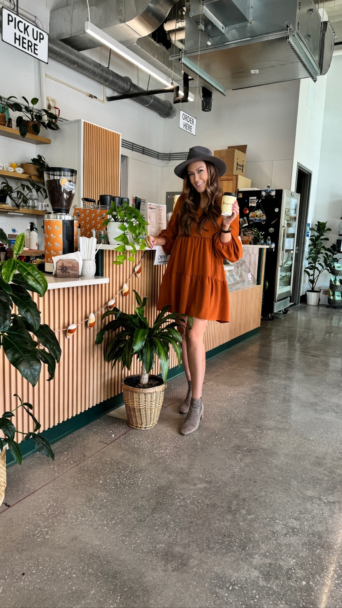 anyone else have a whole different level of confidence when you’re in a good fall dress with a latte in hand? 😂🙋🏻‍♀️
girly, this is the kind of easy throw-on outfit that just works every single time.

the fabric is lightweight but still has that beautiful drape that doesn’t cling, and the tiered cut gives you shape without feeling too fitted. the sleeves are the perfect billowy-but-not-too-big moment, and this color… it’s basically fall in a dress 🧡🍁. pair it with boots, sneakers, a denim jacket — you’ll get so much cost per wear out of this one. you buy clothes to fit your body, not the other way around 🤌💛

I’m 5’6” wearing size small (TTS) in the dress, size 8 (TTS) in the boots, size medium (TTS) in the hat

#LTKdayinmylife #LTKHoliday #LTKSeasonal