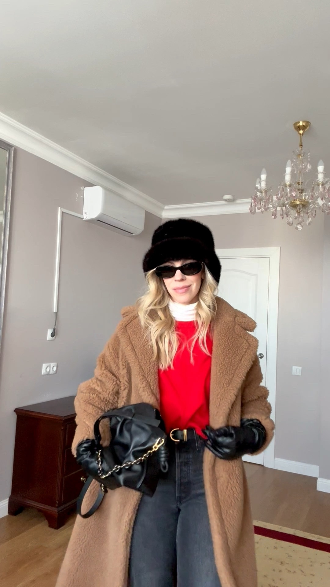 Teddy coat winter outfit, fur bucket hat, red sweater, @Levi's black jeans (25% off right now), black leather gloves, Loewe Flamenco pouch clutch 

#LTKOver40 #LTKootd #LTKSaleAlert