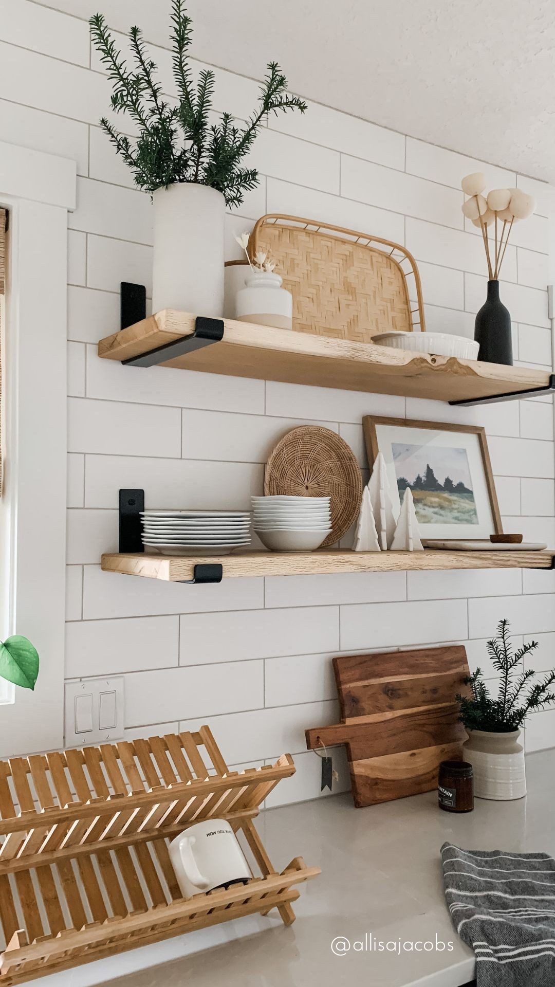 Subtle holiday kitchen shelves with white ceramic trees, greenery, cuttings, and framed evergreen art prints for a little festive nod that last all winter long



#LTKHome #LTKHoliday #LTKSeasonal