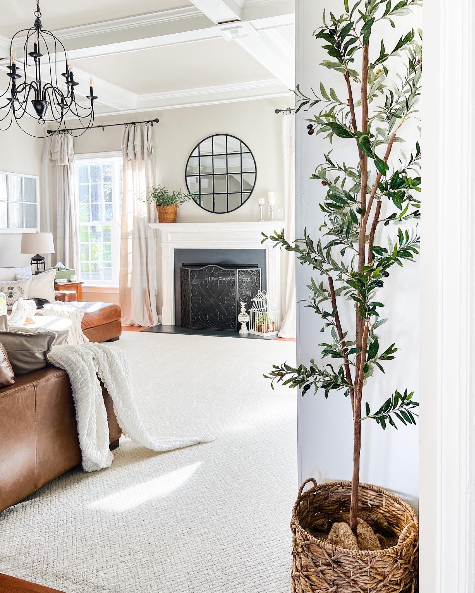 Want to decorate your home for spring with a neutral color scheme? Choose spring decor that will work in your home all season long into summer! The best affordable 7-foot faux olive tree looks great in a large basket. #neutralhome #springdecorating #summerdecorating 


#LTKSeasonal #LTKhome