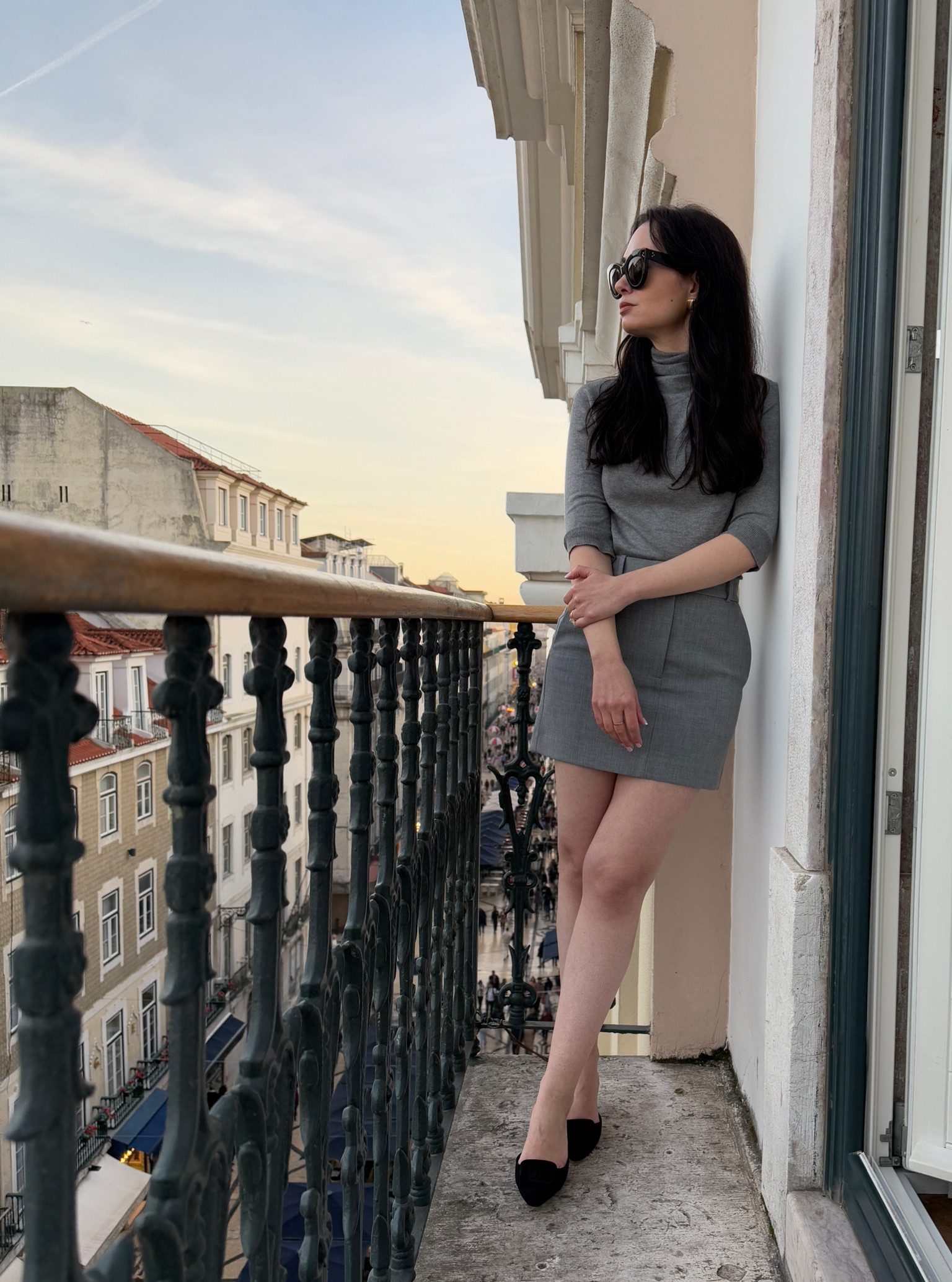 Sweater: Zara
Skirt: Babaton
Heels: Manolo Blahnik
Sunglasses: Celine
Earrings: H&M

#LTKwinter #LTKtravel