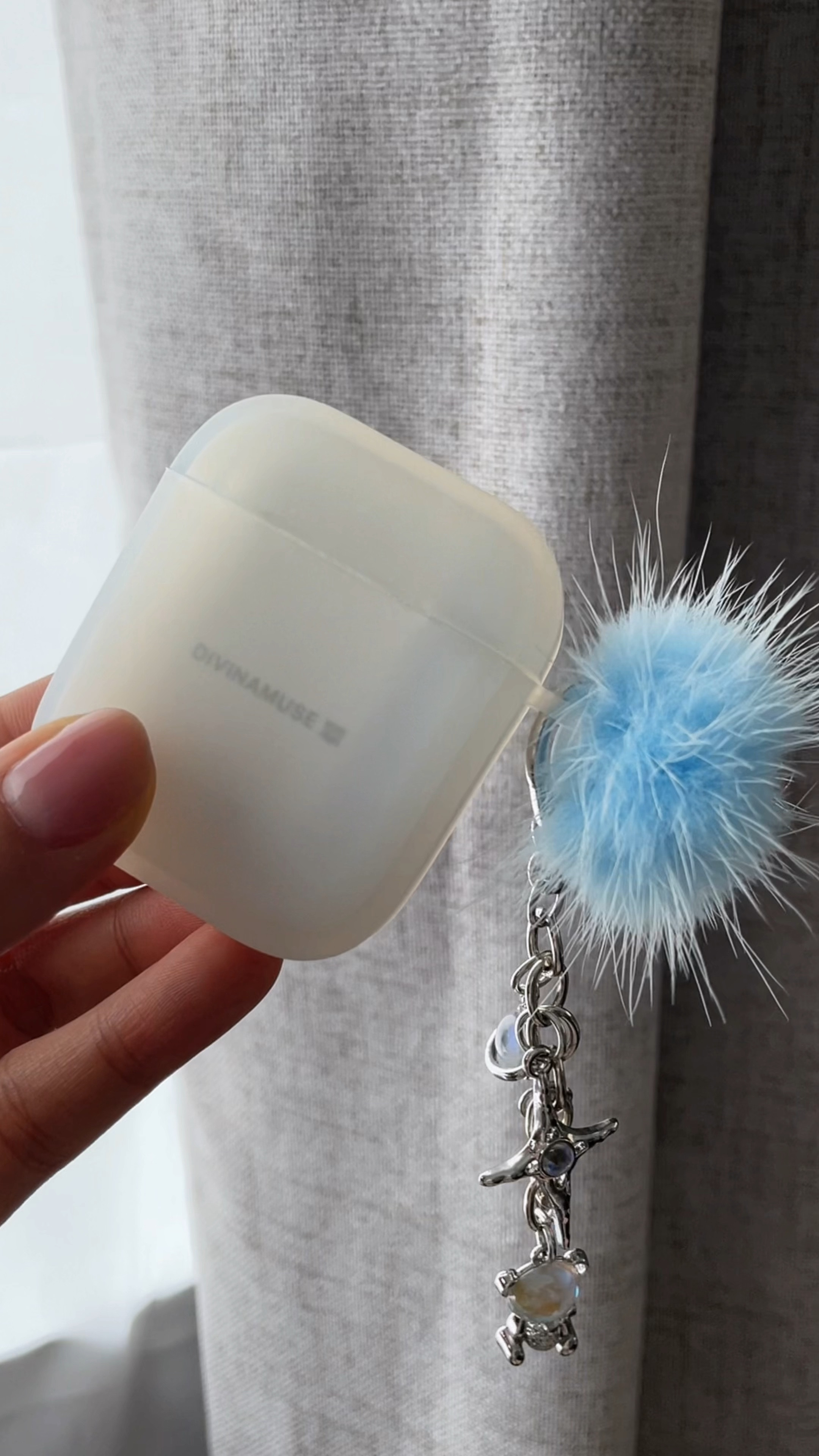 Adding some cuteness to everyday things gives me joy ☺️ I love this semi-transparent, matte AirPods case. I wanted a cute keychain to go with it but something felt off. Like it was missing something. Then this fluffy pompom that was originally a jibbitz kept bugging me on my crocs so I removed it, added a transparent string and tied it to my keychain! It was the missing piece ☺️🤌🏻 
- 
Cute accessories, key chain, AirPods case, work essentials, essentials, school bag, work bag, daily bag, jewelry, accessories, office tools, streetwear 

#LTKstyletip #LTKtravel #LTKVideo
