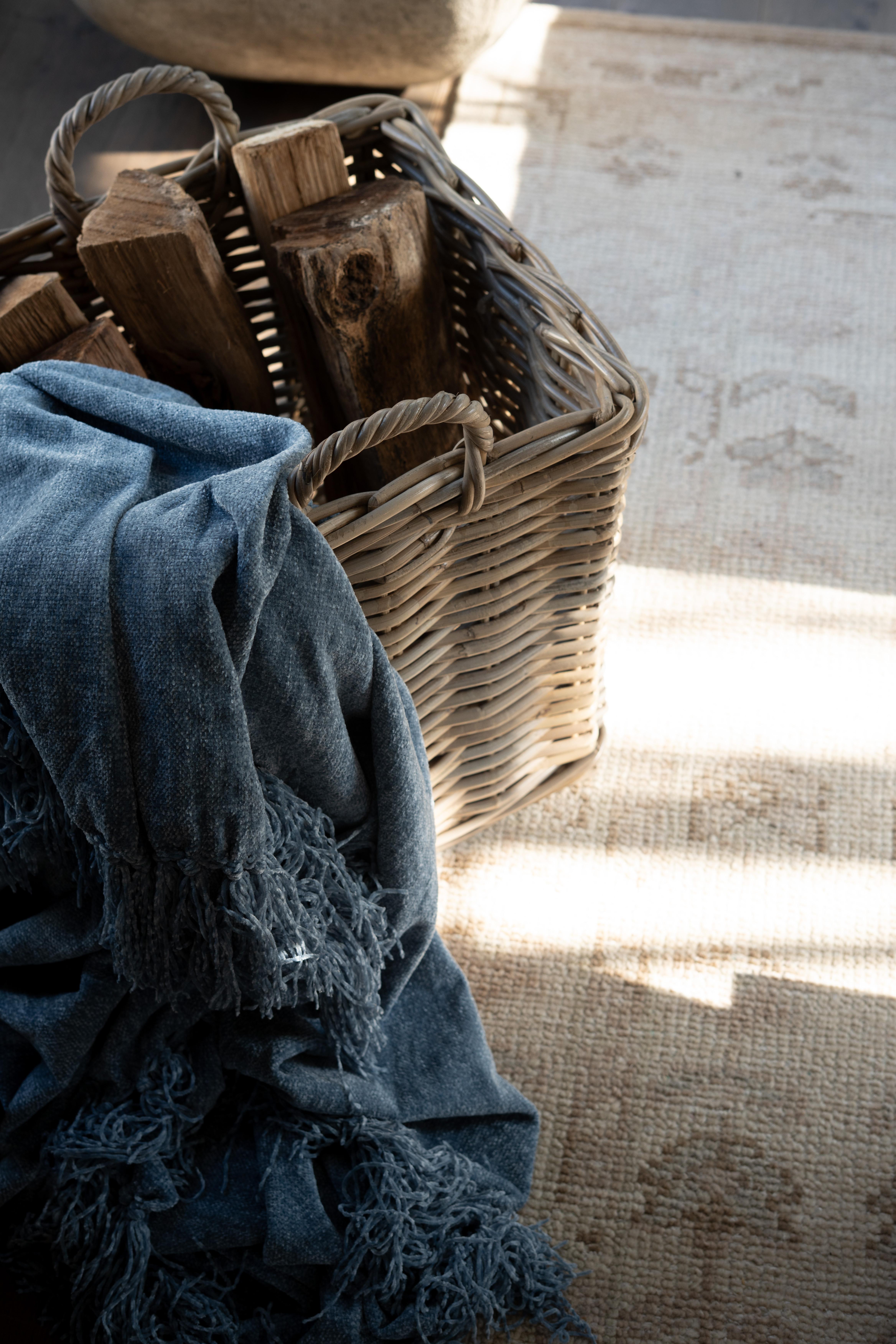 Okay you guys I cannot with this cozy little moment. The woven basket of firewood, the soft blue throw blanket, the warm sunlight streaming across the rug… it’s giving the ultimate cozy living room vibes. I’m obsessed with how these natural textures and neutral tones make the whole space feel calm, warm, and perfectly styled.  

 #LTKmomlife #LTKSeasonal #LTKHome