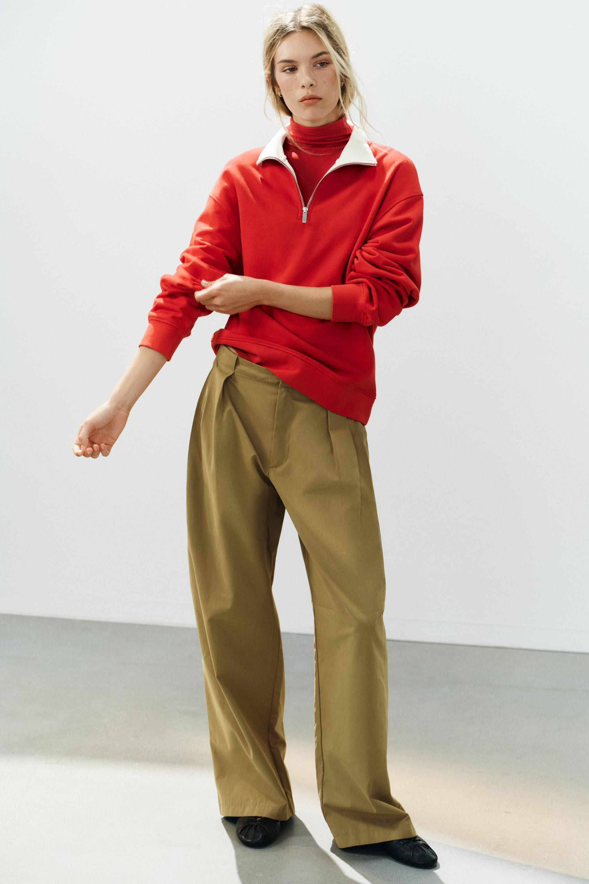 Mid-rise trousers. Side pockets and back faux welt pockets. Features front pleat details. Front c... | Zara US
