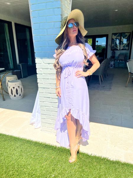 I love this lilac color for summer! This dress is a great deal from Amazon. I mixed it with a beach hat and gold Prada shoes - there are so many ways to style it!

#LTKFind #LTKstyletip #LTKunder50