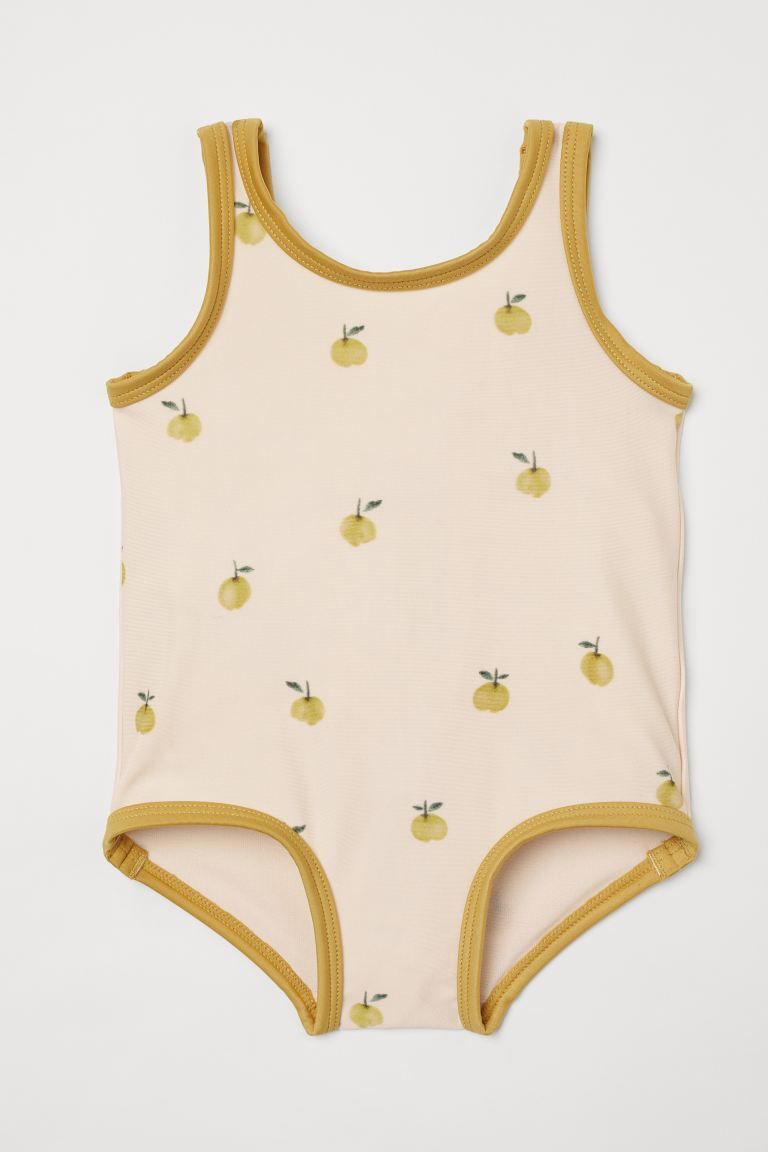 Baby Exclusive. Fully lined swimsuit with contrasting piping. Slightly lower-cut neckline at back... | H&M (US + CA)