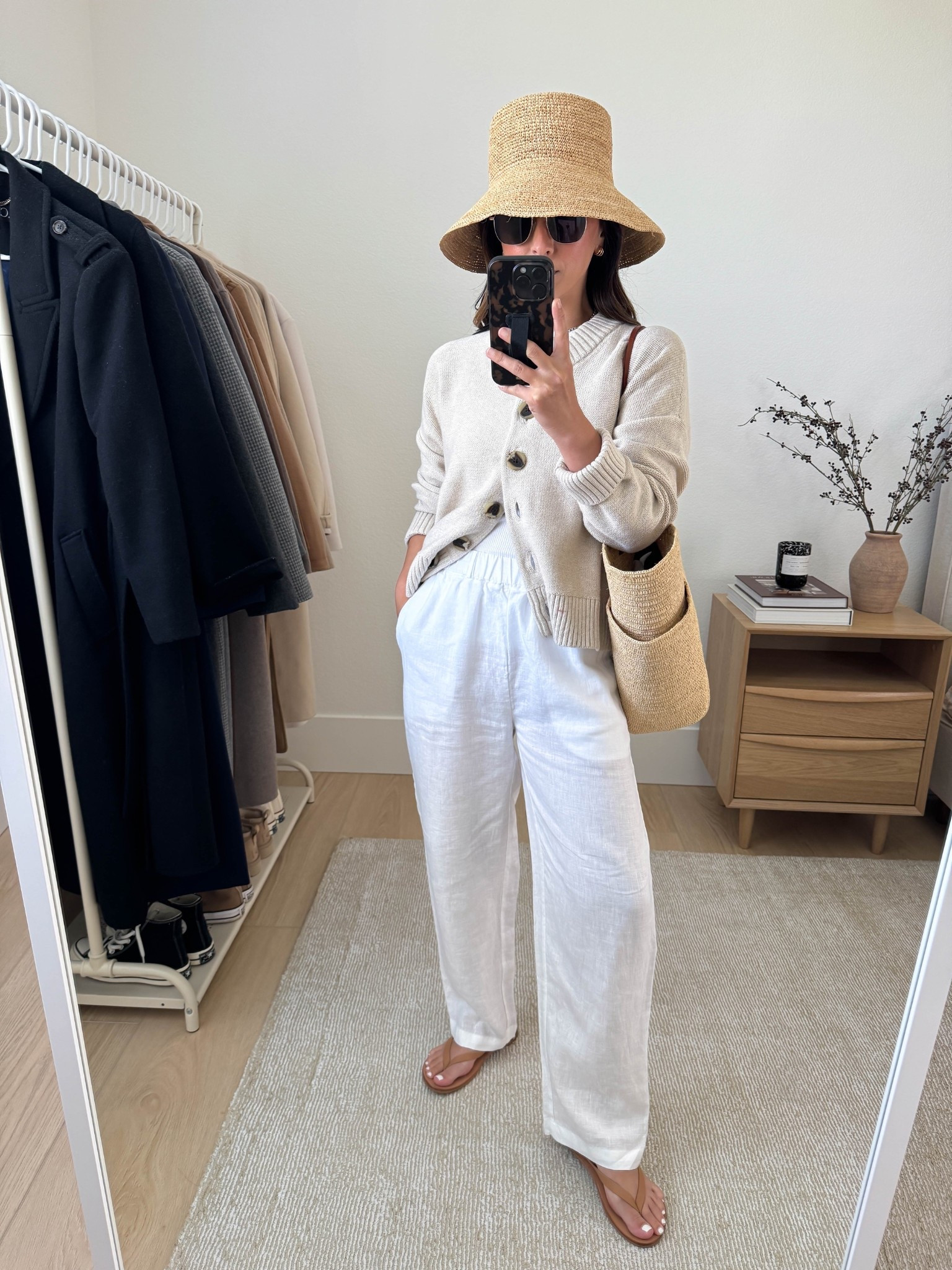 Beach getaway outfits ideas wearing Quince pieces. This cardigan has become a go-to. I sized up for a roomy fit, but you don't need to. 

Quince cardigan small
Quince linen pants xs
Beek sandals 5 (old)
Sezane tote
Jenni Kayne hat s/m. Linking a similar one too
Le Spec sunglasses
J.Crew earrings
Dorsey James necklace 15"

#LTKPetite #LTKStyleTip #LTKItBag