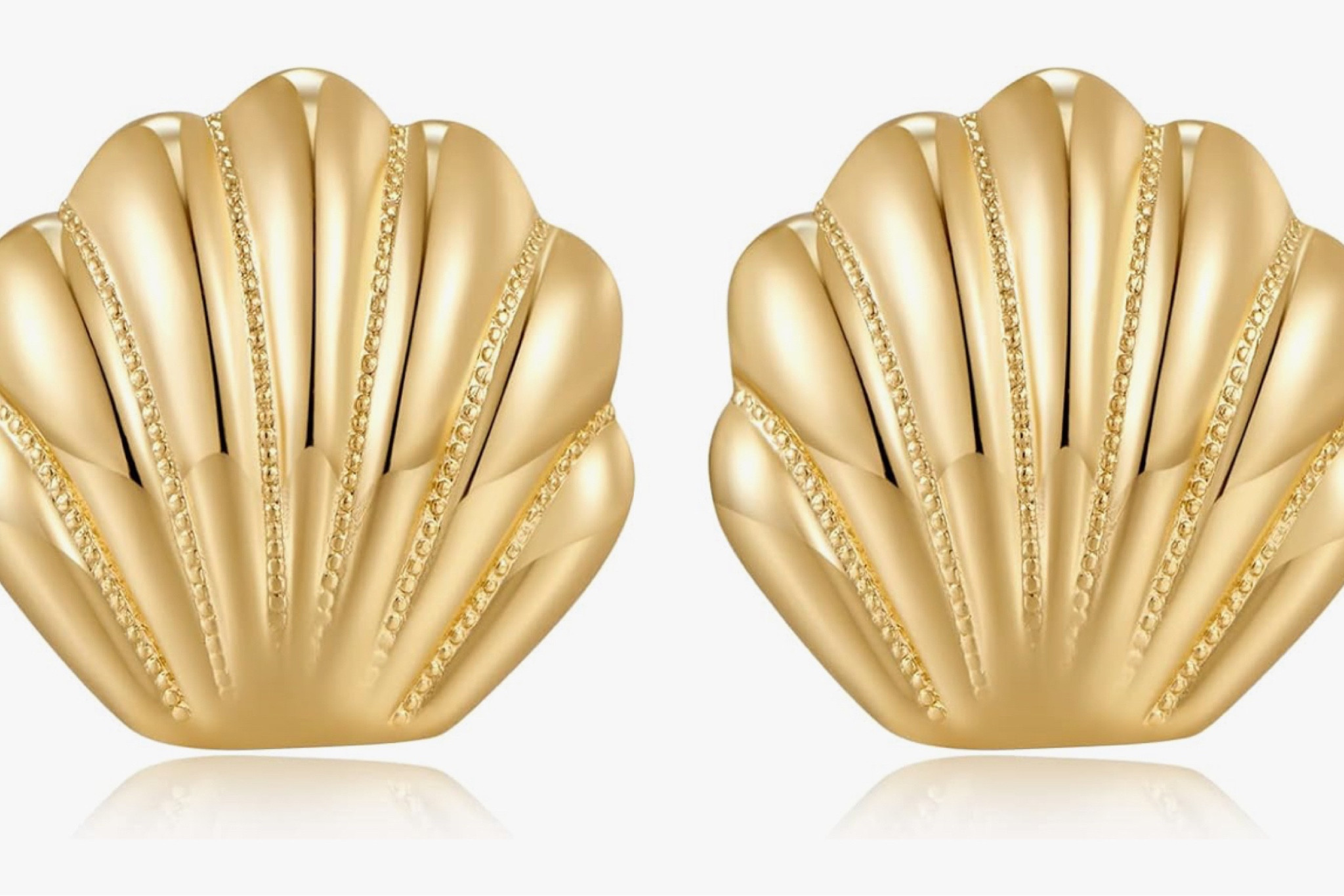 Seashell earrings for beach vacation 

#LTKtravel #LTKswim #LTKSeasonal