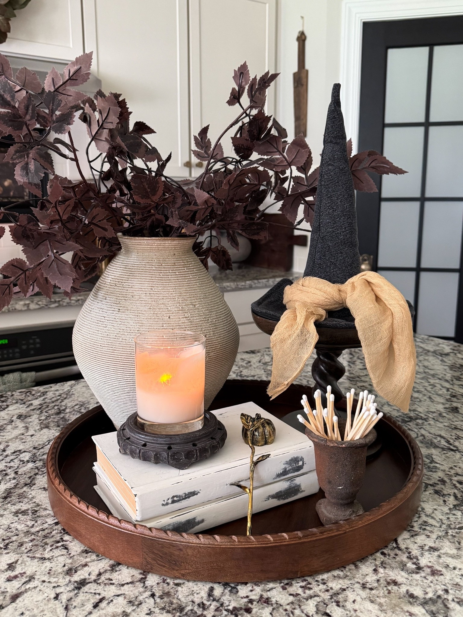 A chic vintage tray styling for Halloween!! I’ve sourced several vintage pedestals like mine. The tray I used is currently out of stock so I’ve linked several other options. 


Round tray, vintage barley twist pedestal, white vase, plum stems, witch hats, vintage looking books, black pedestal for candle, pumpkin snuffer, mini urn, matches

#LTKstorytime #LTKSeasonal #LTKHome