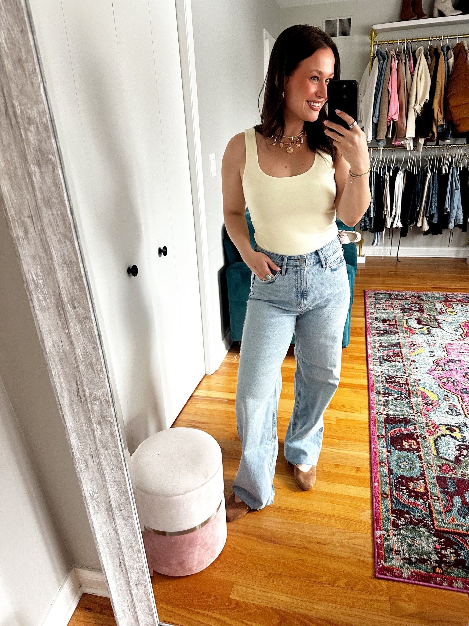 I have these in the black wash, dark blue wash and now the lighter blue. I love so much!! Very comfy, super high rise! Just a great pair of very affordable jeans! And this cute little yellow tank top is on sale too! #momoutfit #springoutfit #jeans 

#LTKmomlife #LTKootd #LTKSaleAlert