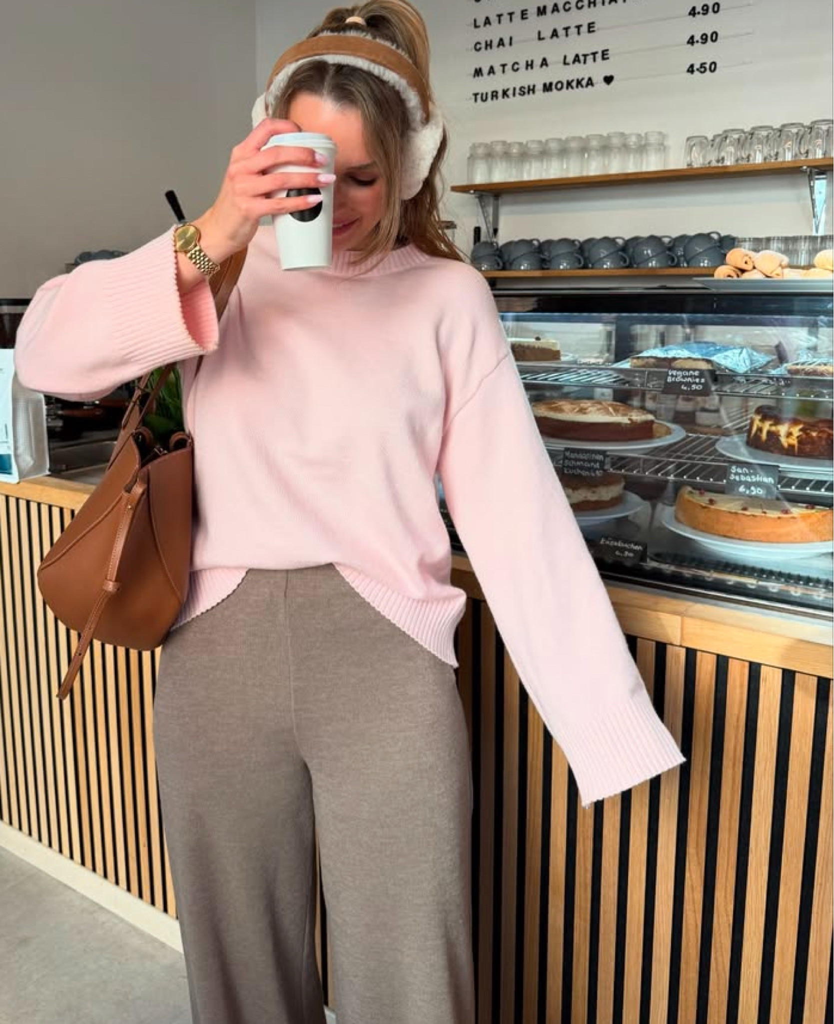 Baby pink sweater 
Light brown  knit pants 
Brown tote bag 

#LTKMostLoved #LTKPetite #LTKStyleTip