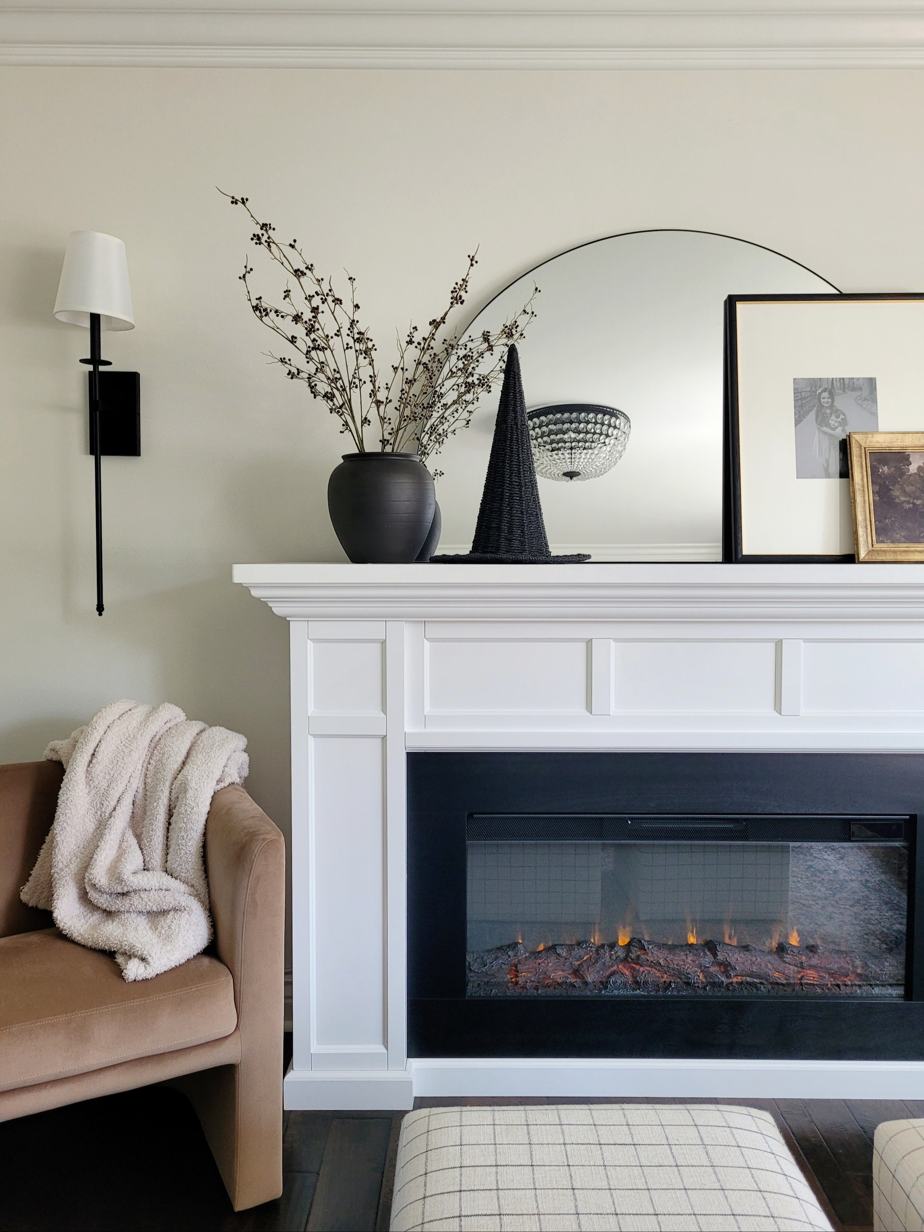 Halloween living room decor,  mantle styling,  Halloween fireplace,  electric fireplace and oversized sconces

#LTKSeasonal #LTKHome #LTKHalloween