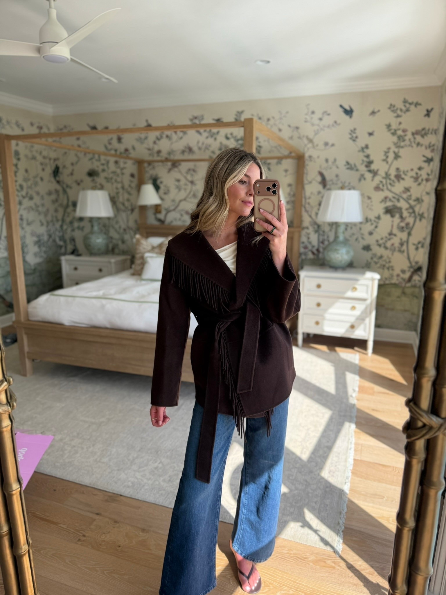 this fringe jacket is such a good fall statement layer! i love the deep chocolate color, belted shape, and the fringe detail gives it a little western feel without being too much.

i’d wear it exactly like this with denim + a simple top, but it would also be so good over a dress or with trousers and boots once it gets cooler. such a fun piece for dinners, weekends, or any easy fall outfit that needs a little something extra.

#LTKSeasonal #LTKootd
