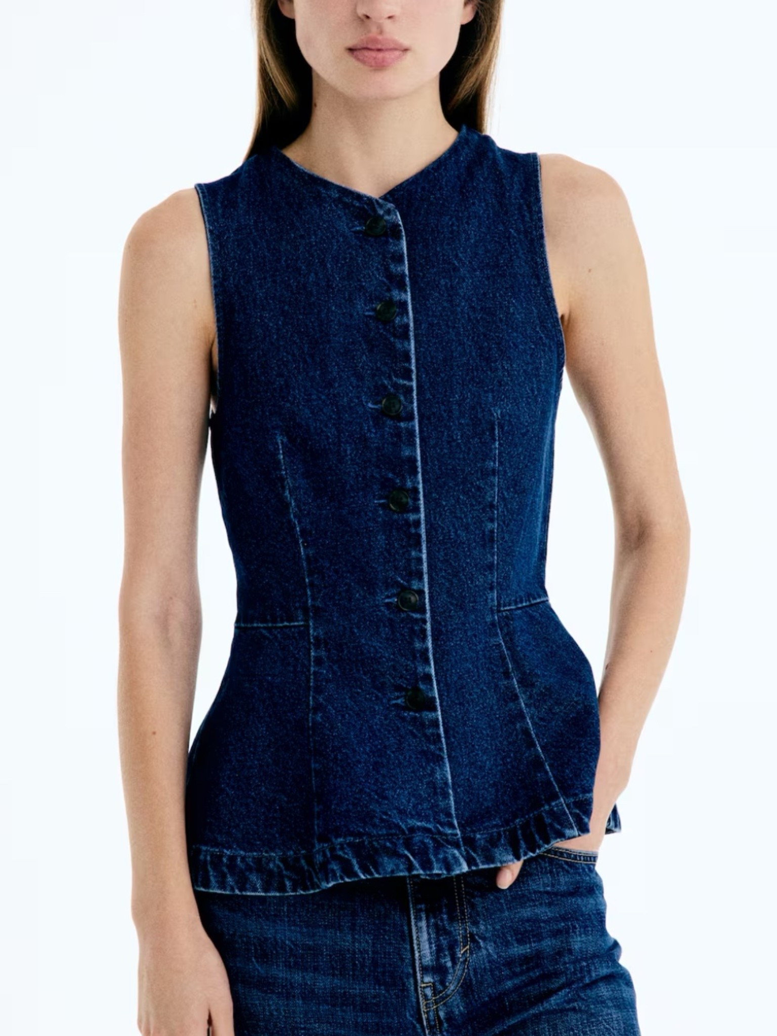 If you’re still looking for a denim vest this is the denim version of my pink vest that I’ve styled. It’s so cute and I love the peplum. I do a smalll