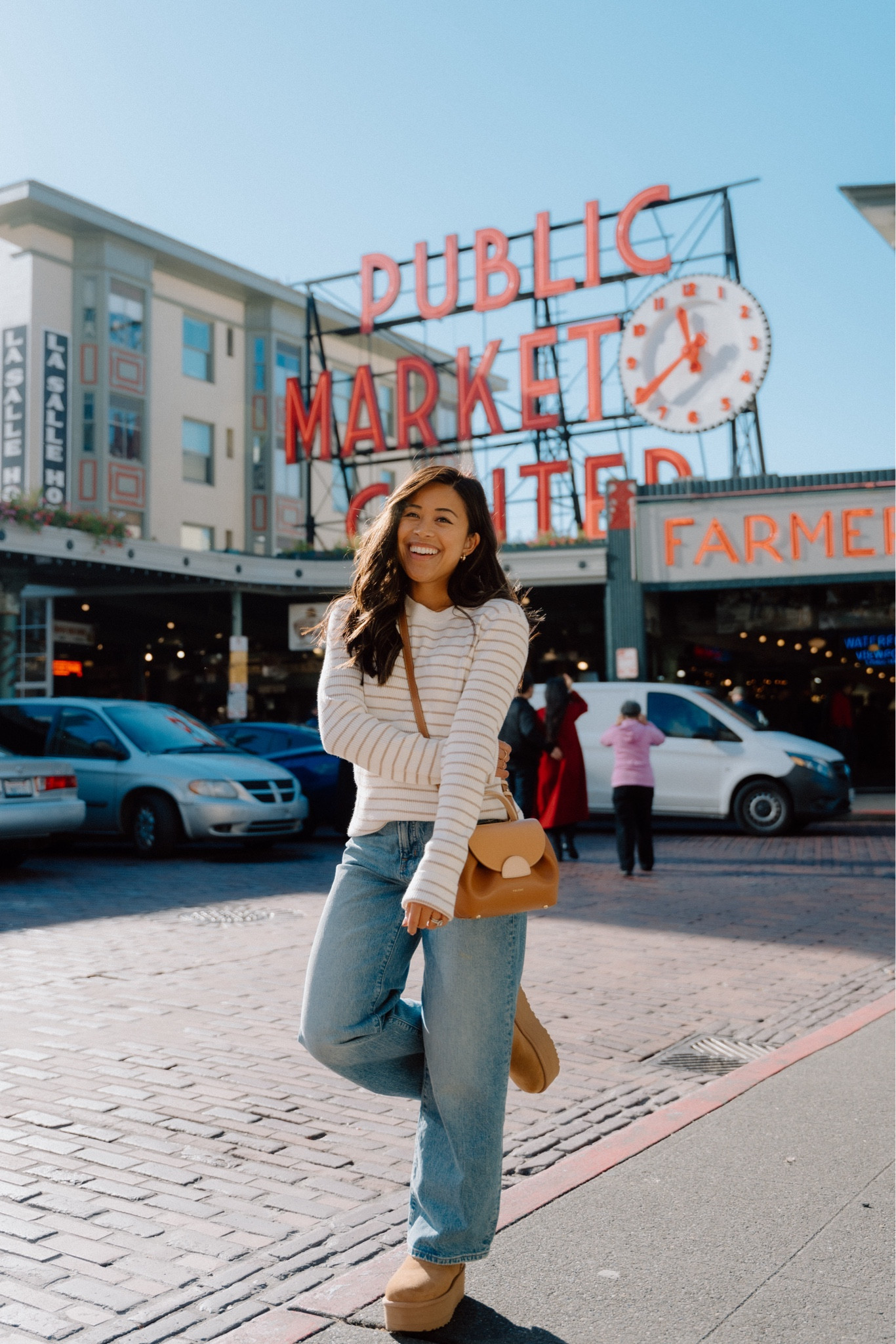 Casual fall outfit in Seattle! UGG boots, loose fitting jeans, and a stripe long sleeve sweater. 

#LTKHoliday #LTKSeasonal #LTKGiftGuide