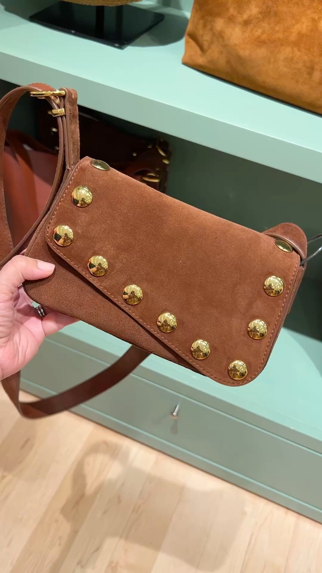 Such a beautiful bag for fall! This brown suede bag with gold studs will add the perfect finishing touch to any fall outfit. Such a great statement piece that’s a great size for carrying all of the daily essentials! 

#LTKItBag #LTKSeasonal #LTKxMadewell