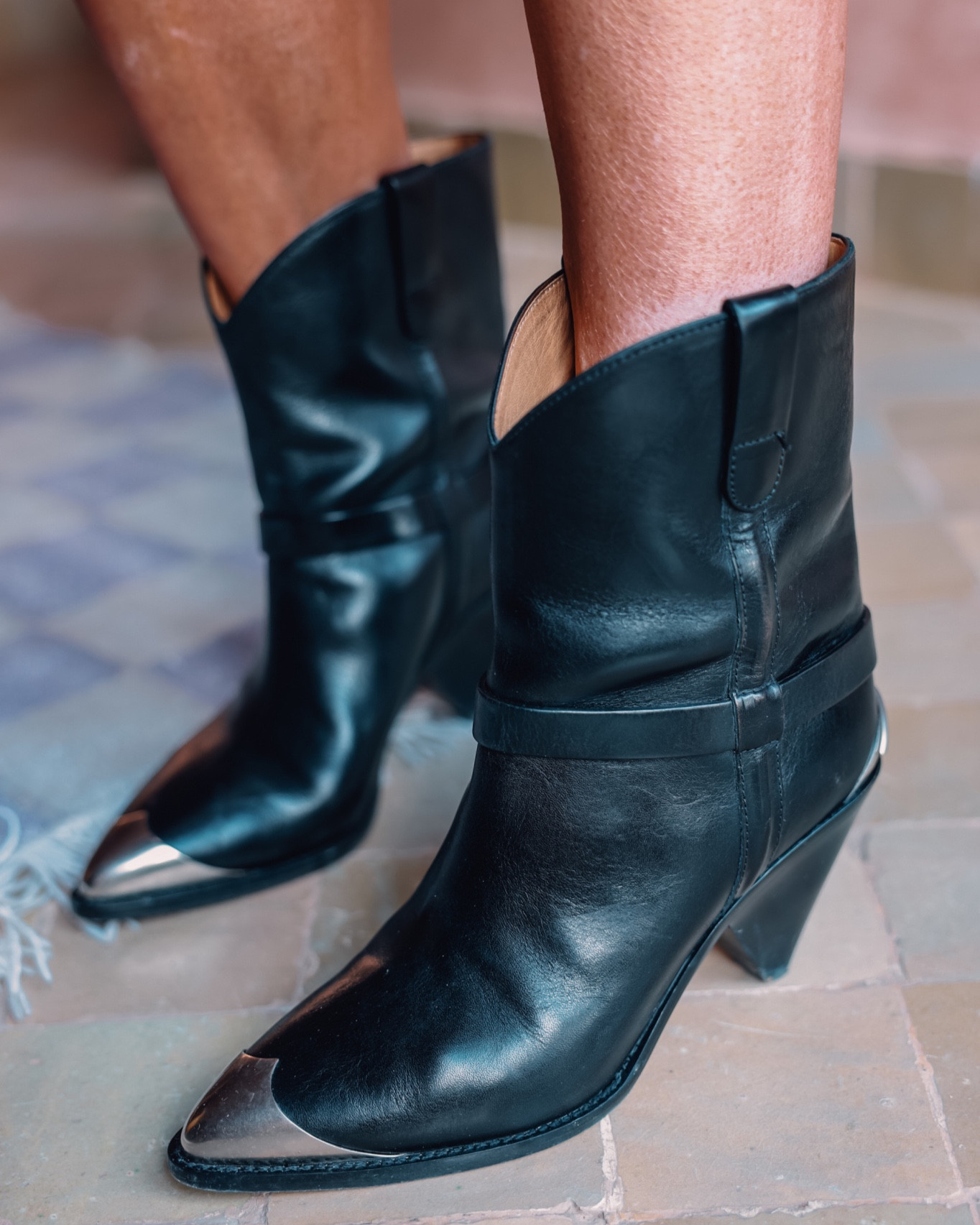 Nothing like a pair of killer statement boots to really turn heads, right?! You can make a statement with any kind of shoes or boots but I love the silver details on these Isabel Marant western-inspired boots! You could also go with metallic boots, studded boots, combat boots, printed boots, architecturally shaped boots, embellished boots, etc. Choose a pair that feels like YOU and goes with your personal style.

~Erin xo

#LTKstyletip #LTKshoecrush #LTKHoliday