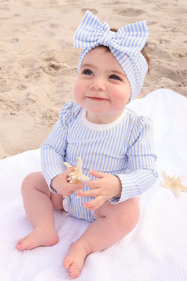 Long Sleeve Rash Guard With Ruffle Bottom | Seersucker Blue | Caden Lane