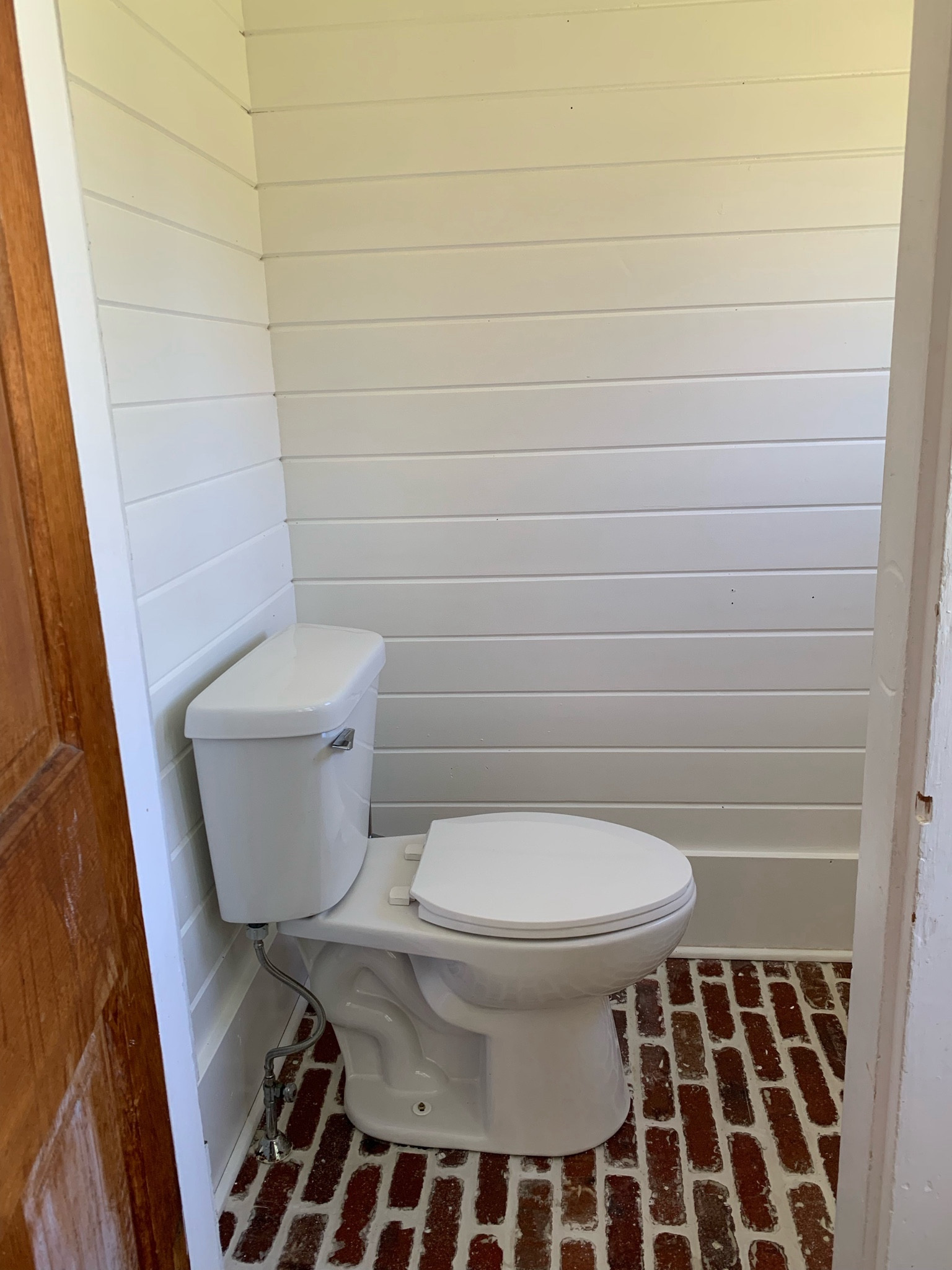 We love a bathroom glowup. Mid-project with shiplap and brick floor install. 🏷️ grandmillenial home, English farmhouse, classic home, DIY

#LTKhome