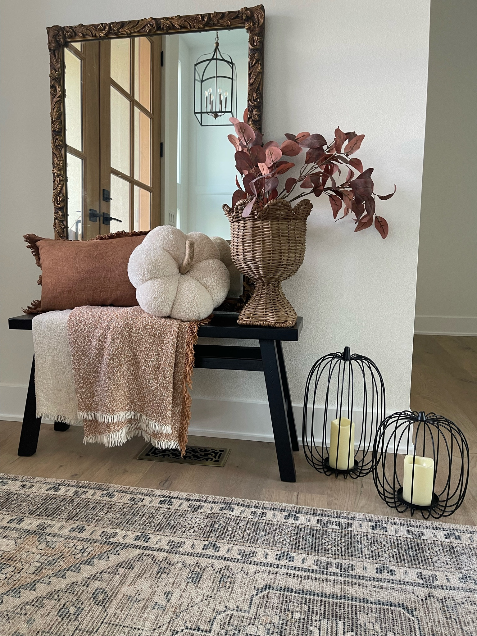 Front entryway home decor // Black Threshold Bench// Decor for small spaces // Throw pillow covers from Amazon // Black Metal outdoor indoor pumpkins with faux candles // Faux fall plants // 

#LTKHome #LTKSeasonal #LTKFallSale