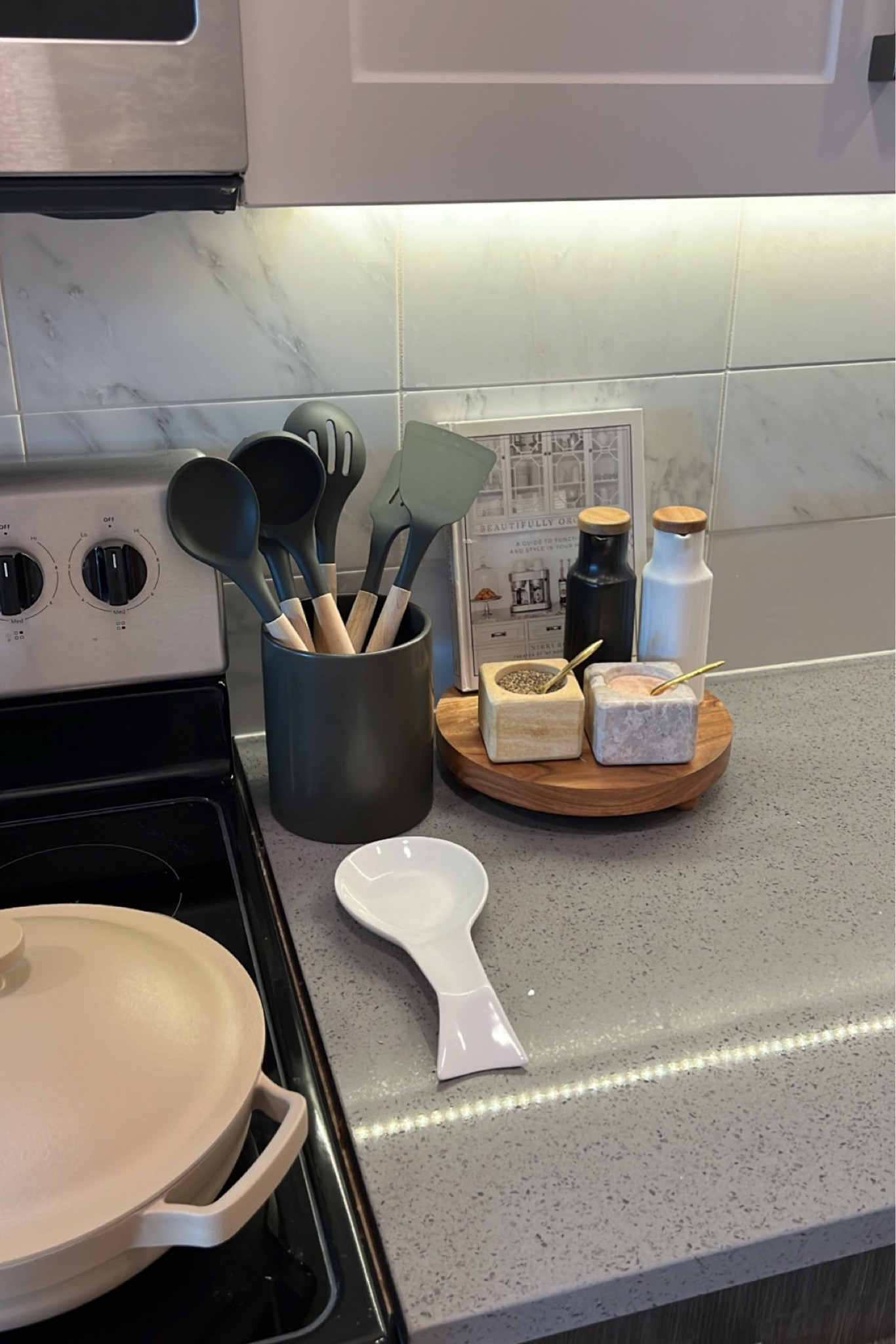Trying to give the home a little spring refresh starting with the kitchen✨ I grabbed everything from Amazon & it’s all very budget friendly! (linked on my LTK, link in bio, but you already knew that 🤓)

How do you prefer the wood stand styled? 

By the sink: with dish soap, dish brush, trinket bowl & a plant 

OR

By the stove: with these ceramic oil & vinegar dispensers, salt and pepper set 🤌, & a cook book 👀 okay it’s not a cookbook but you get the point! 

#homedecor #homeorganization #kitchendecor #kitchendetails #homeinspo  

#LTKSeasonal #LTKunder50 #LTKhome

#LTKGiftGuide #LTKHoliday #LTKhome