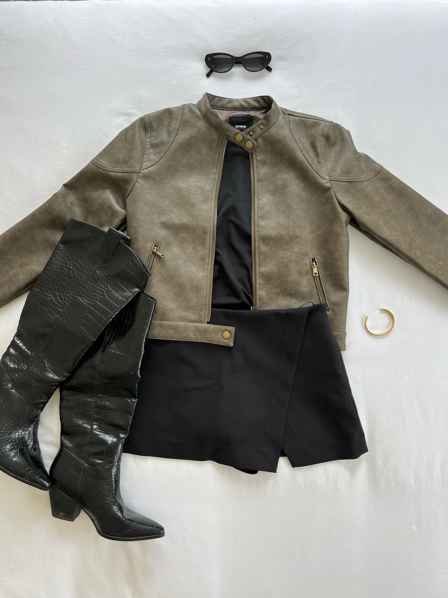 Transitional outfit inspo - leather jacket, black mini skirt, knee high boots 
