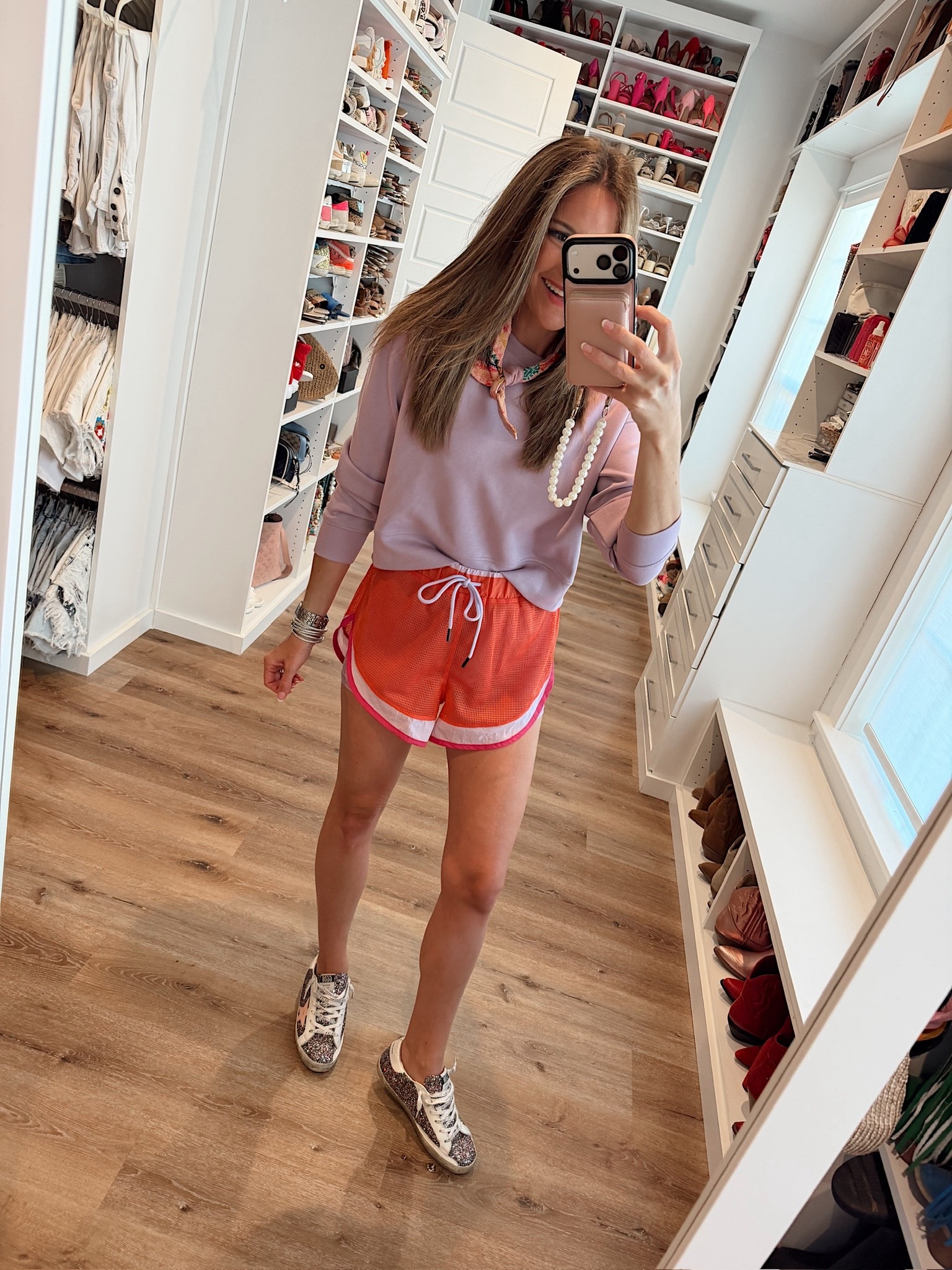 Spring athleisure ootd! In a medium crop sweatshirt, small shorts, scarf, sneakers and accessories- fits tts. Shorts are on sale for $14 on Amazon prime vs $68 from free people! 

#LTKSeasonal #LTKmomlife #LTKootd