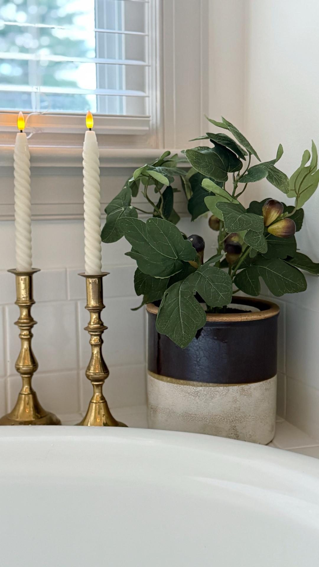 This fig tree is the cutest thing ever!  It stands 13” tall with faux figs and big leaves.   I put mine into an old crock and it’s gives our bathroom a pop of color and texture.  And the best news is that it’s less than $19!!

#LTKSeasonal #LTKHome