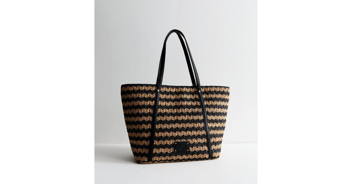 Black Woven Large Tote 
						
						Add to Saved Items
						Remove from Saved Items | New Look (UK)