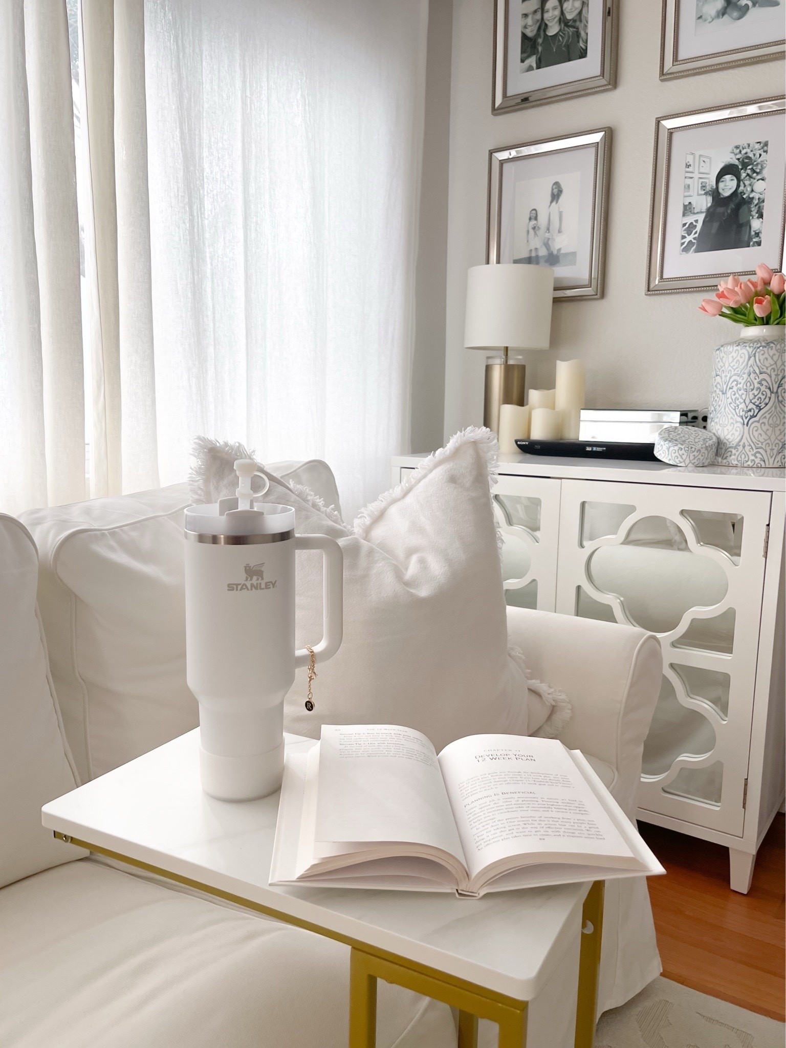 White family room 🤍

Slipcover couch, couch table, book, travel tumbler, cabinets, ginger vase, mirror box

#LTKHome #LTKmorningroutine