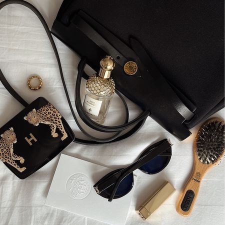 Hermes Herbag, Hourglass leopard ambient palette, Guerlain perfume, YSL sunglasses, Anisa Sojka ring, Hourglass lipstick, Kent bristle hairbrush, old money style, what’s in my bag, it bag

#LTKstyletip #LTKitbag #LTKSeasonal