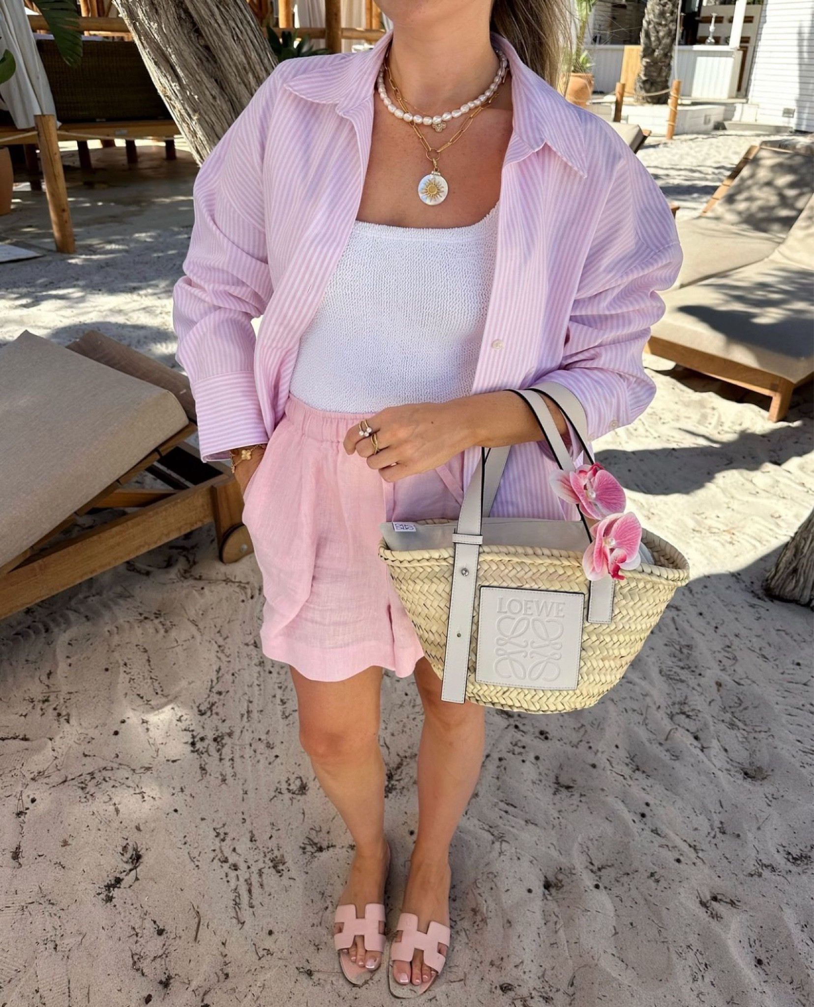 Beach days in my favourite colour 💕 Pink stripes, giving all beach summery sweet vibes, colourful linen look with my new Loewe basket raffia bag in white  

#LTKluxury #LTKsummer #LTKeurope