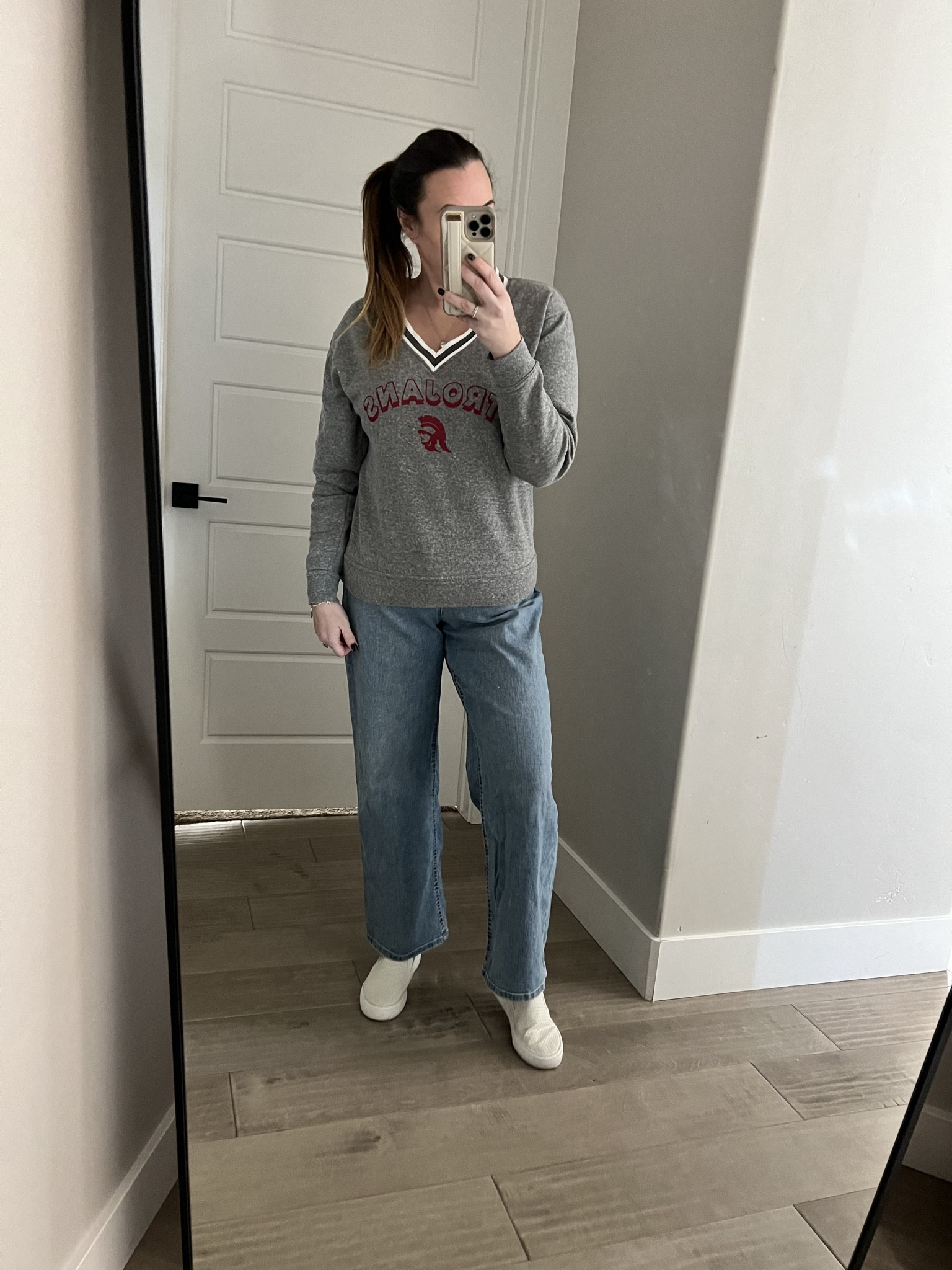 I’m still not sold on this wide leg jean trend… thoughts? It might be my body dysmorphia but I feel like it makes me look heavier. 

These are an affordable wide leg denim from Walmart. They are comfy though! 

But I do love this preppy vneck. I got a lot of compliments on it yesterday when I was out! The receptionist at my dental office told me she loved it because she doesn’t like crew necks! I linked some various similar v-neck pullovers! This one has my Alma mater on it USC #gotrojans #fighton. 

#LTKmidsize #LTKover40 #LTKfindsunder50