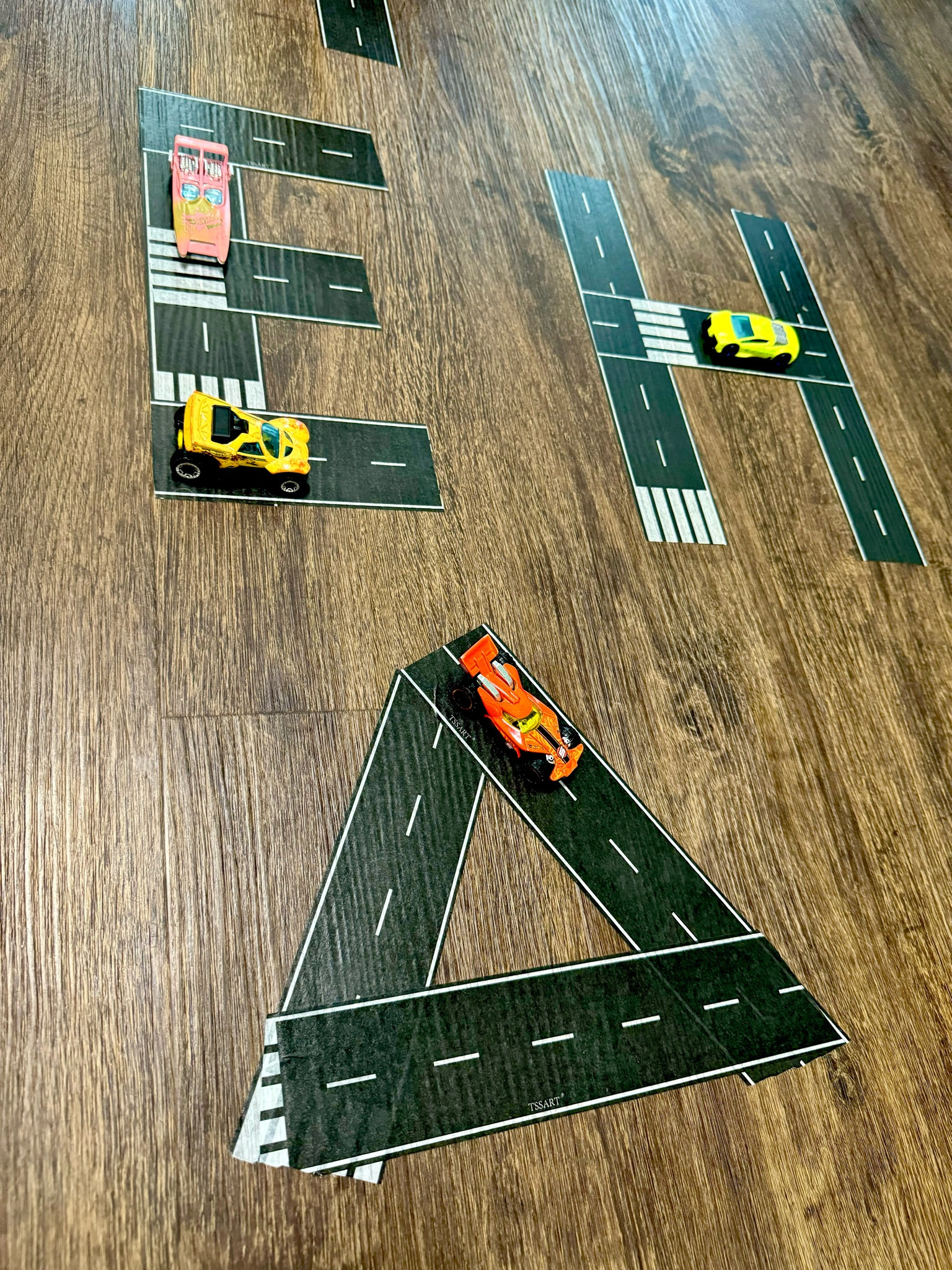 We love to make letters & shapes with the road tape! It is important to offer kids various ways to explore lines, and this road tape is a fun hands on opportunity to practice  prewriting skills! 

#prewritingskills #earlychildhoodeducation #learningthroughplay #literacy #hotwheels #monstertrucks #homeschool  
