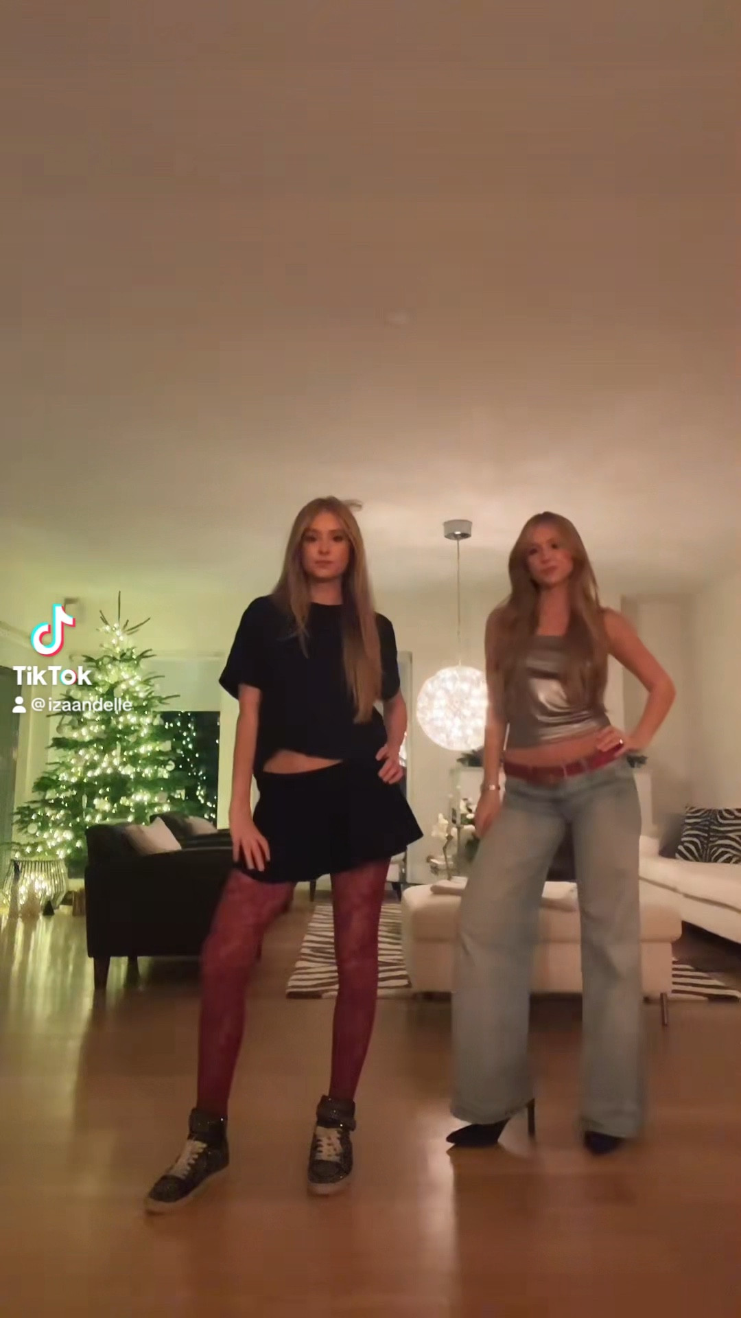 Silver top, low rise jeans, black oversized t-shirt, red lace tights, revolve, free people 

#LTKstyletip #LTKeurope #LTKSeasonal