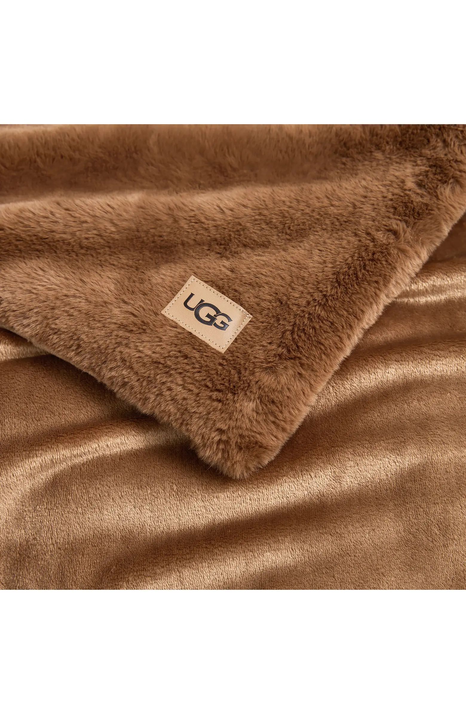 Two different kinds of cozy—flannel and plush—warm this throw that's so irresistibly soft you... | Nordstrom