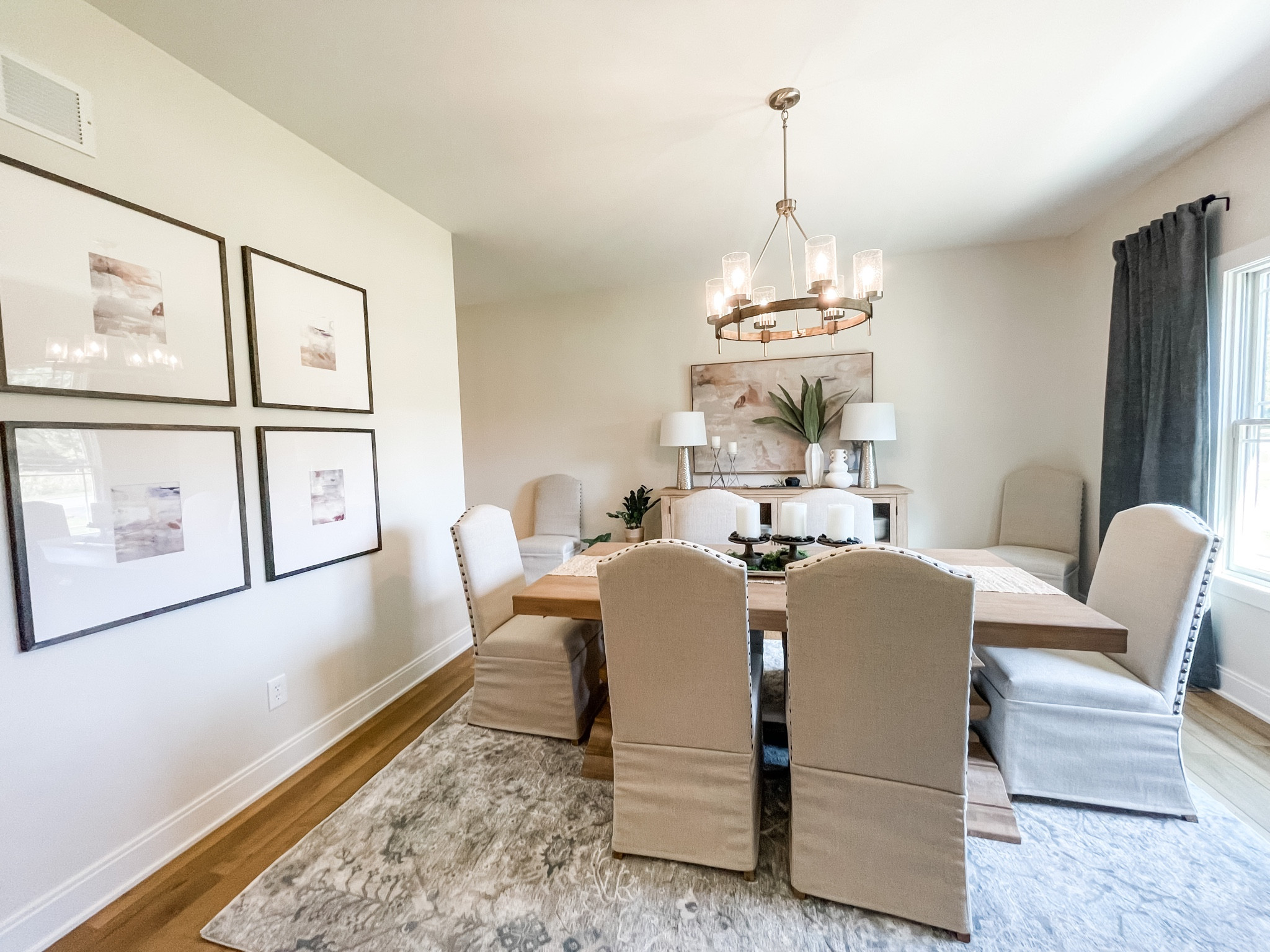 Take a look at this stunning dining room. We used art from target to pull everything together! 

#LTKhome