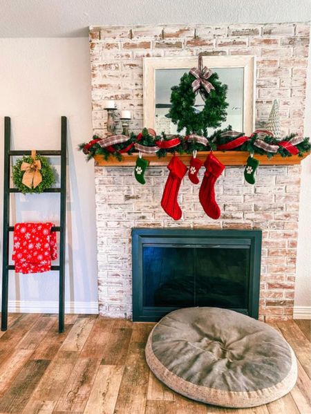 Christmas mantle 
Stockings
Garland
Wreath 
Blanket ladder
Christmas holiday decor

#LTKHoliday #LTKhome #LTKSeasonal