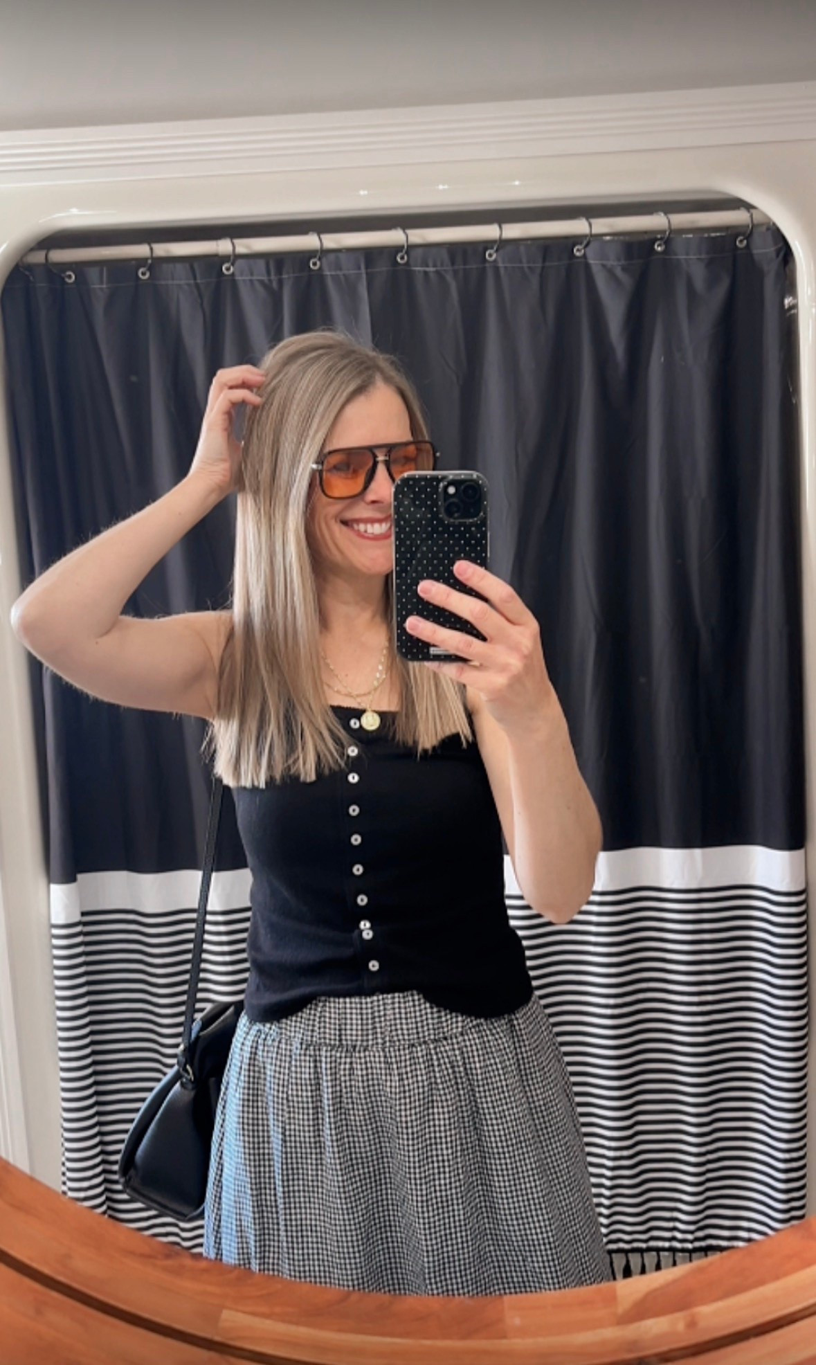 Easy outfit formula lately 🤍
A black button tank + flowy gingham skirt + oversized sunnies = comfy but still feels put together. These are the kind of pieces I can wear all day and actually want to repeat. 🖤

#LTKootd #LTKgrwm #LTKmorningroutine