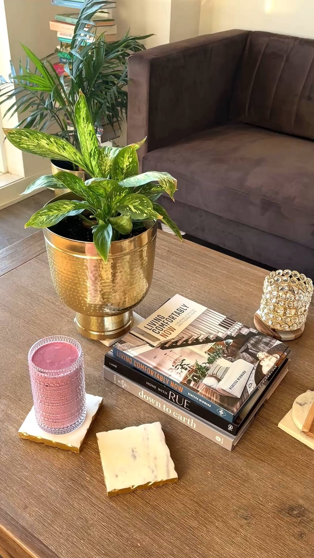 Quiet morning vibes ✨ A fiber + protein-rich smoothie in a hobnail glass, surrounded by the details that make a living room feel elegant — coffee table books, marble coasters, and a gold planter. 

#LTKHome #LTKFindsUnder50