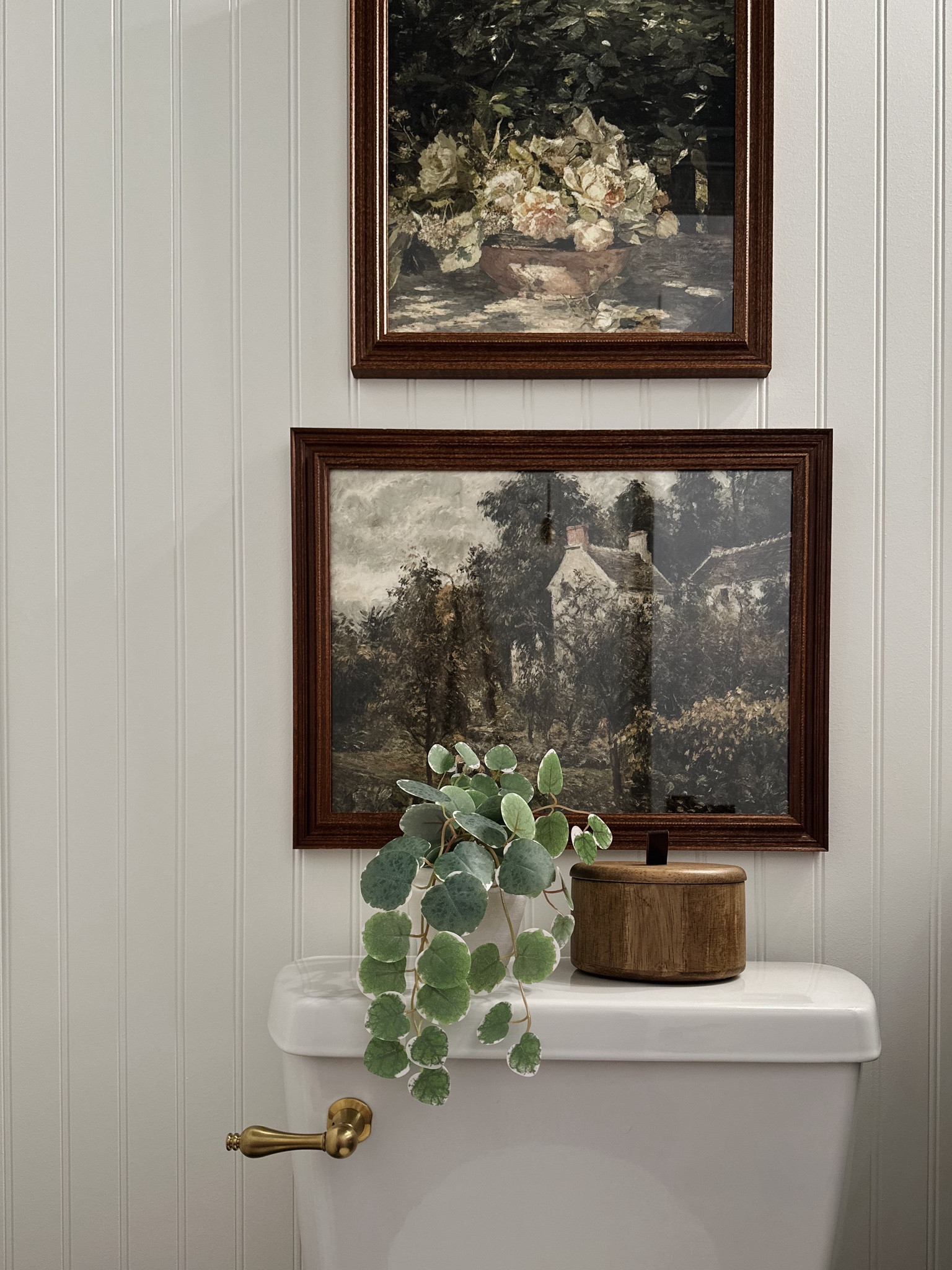 These brass toilet levers are a little boujee but they are such a small change that really impacts the space!

vintage art, Amazon finds, hearth and hand home decor, walnut picture frame, brass toilet lever, faux pothos plant, bathroom plant, wood container, wood casaluna canister, white beadboard, small bathroom 

#LTKHome #LTKStyleTip