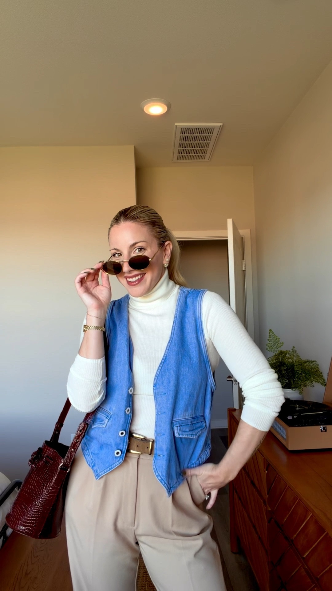 Quiet Luxury Winter Capsule Outfit

Winter workwear but make it quiet luxury 🤍
Here’s how I styled my capsule basics — tailored neutral trousers, soft layering long sleeve, denim vest, and burgundy accessories to add that elevated cool-girl finish. Perfect for work days, coffee meetings, or winter date nights.

Outfit Details:
– Favorite Daughter The Favorite Trousers (Beige)
– Favorite Daughter Amelia Soft Long Sleeve (Cream)
– Favorite Daughter Poppy Denim Vest (similar linked since NLA)
– Sezane Farrow Bag (Burgundy)
– Sezane Axell Boots
– Dior Earrings
– Sezane Sydney Hair Tie

quiet luxury outfit, winter capsule wardrobe, work outfit ideas, neutral wardrobe staples, minimalist chic outfit, business casual winter style, Favorite Daughter trousers, Sezane style, effortless chic


#LTKgrwm #LTKootd #LTKWorkwear