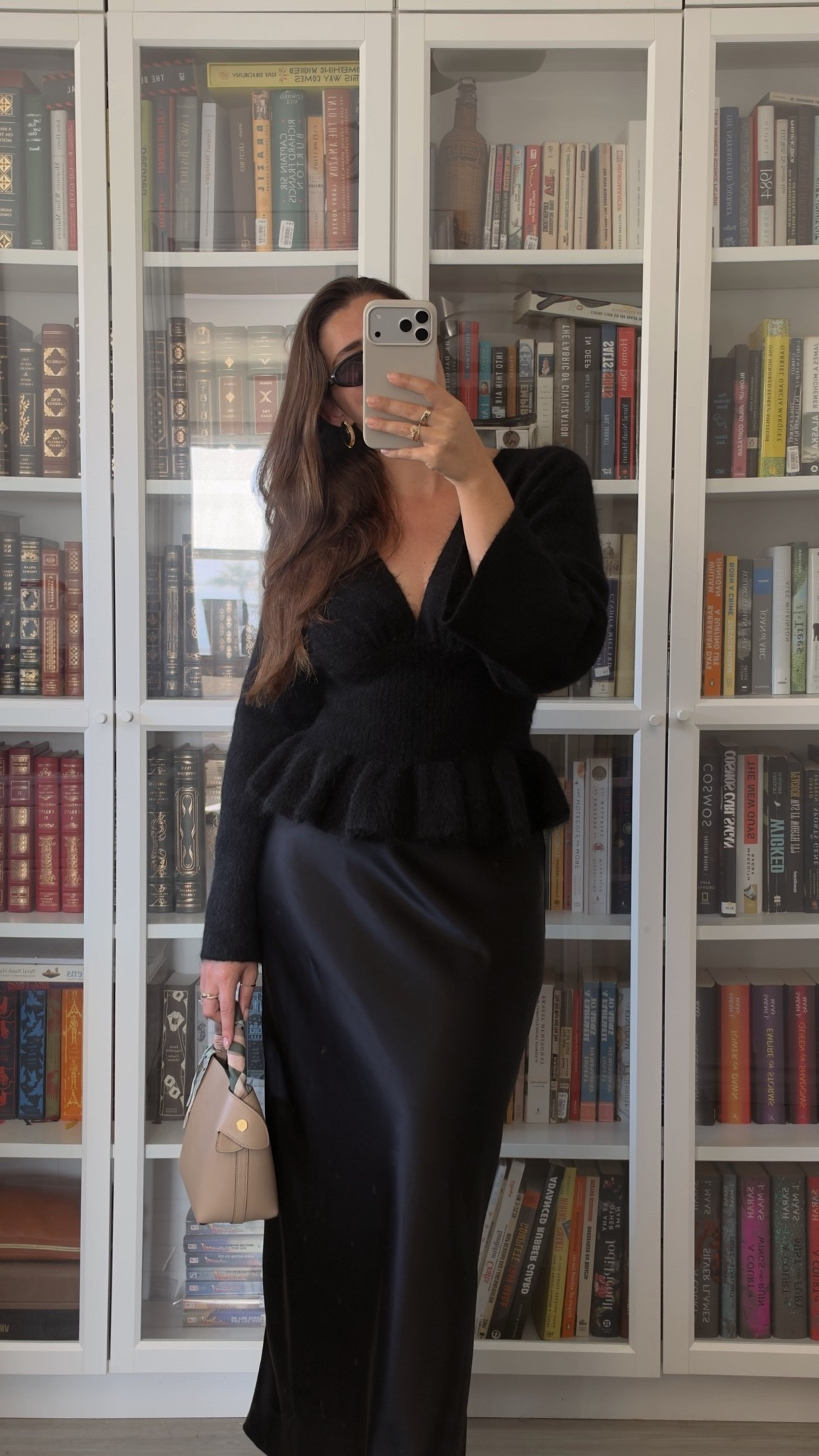 Love this new @SEZANE sweater 🖤

Loved the style so much I just ordered it in the ivory color too 🤍 can’t wait to style them this season!

Details:
Sweater: @SEZANE, wearing size S
Skirt: @Aritzia 
Purse: Fleuron Mini Swann in Sable, can’t link here but I’ve included other options 🫶

With Amour, M.

#LTKdayinmylife #LTKgrwm #LTKSeasonal