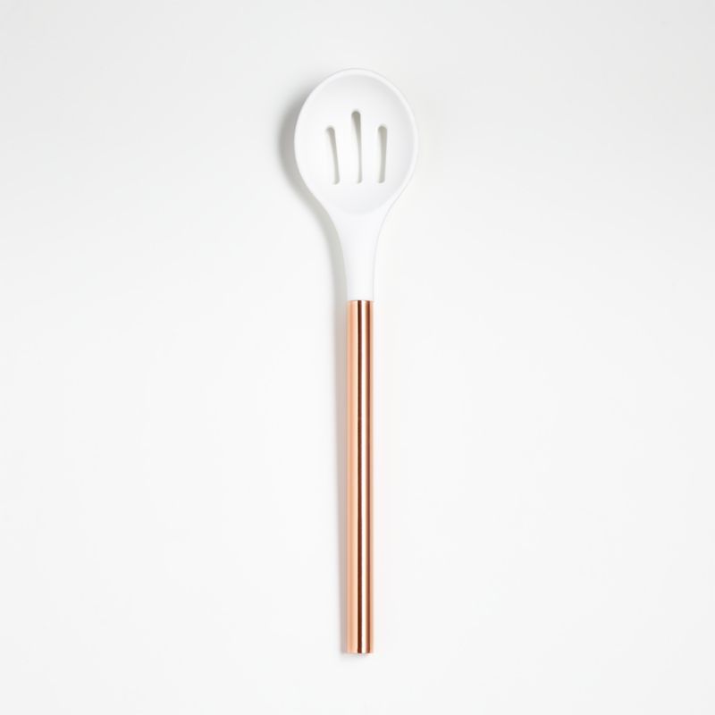 Ada White Silicone Slotted Spoon with Copper Handle | Crate and Barrel | Crate & Barrel