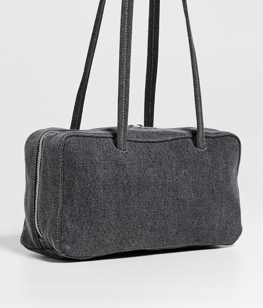 BAGGU
Denim Bowler Bag

This bowler bag from BAGGU features silver-tone hardware, a zip closure, and shoulder straps. The denim construction and compact silhouette make it a practical choice for casual, on-the-go style.

#LTKootd #LTKTravel #LTKWorkwear
