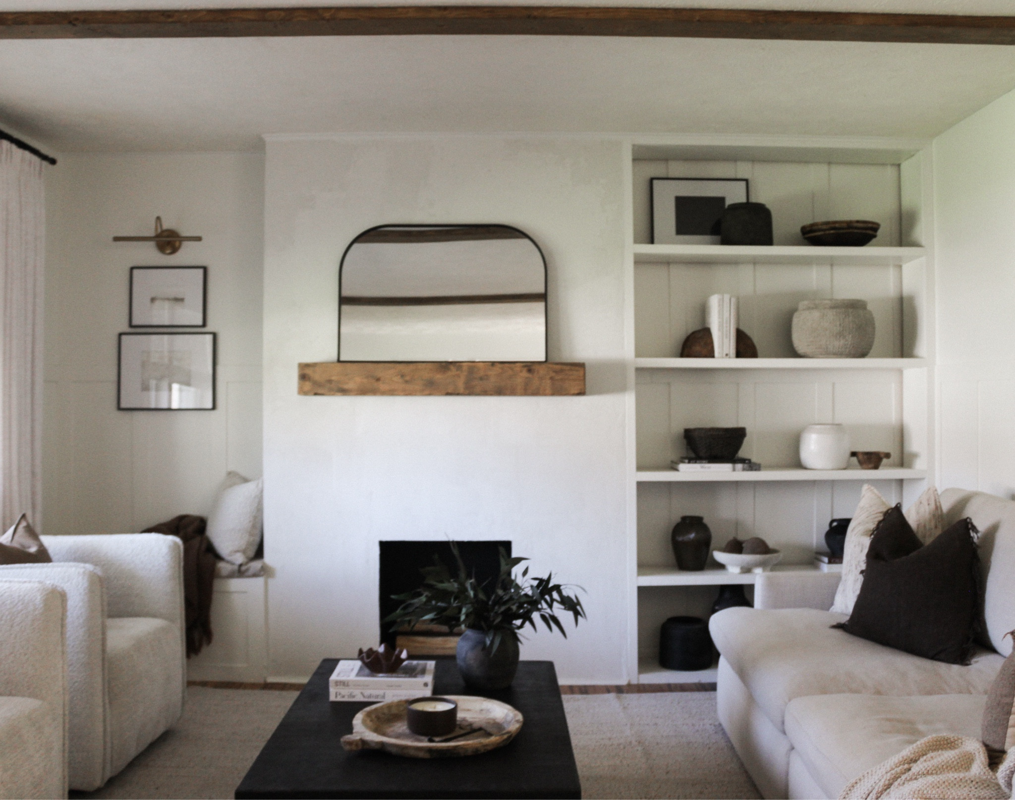 living room styling - black coffee table, boucle arm chairs neutral jute cotton no shed rug

#LTKStyleTip #LTKFindsUnder100 #LTKHome