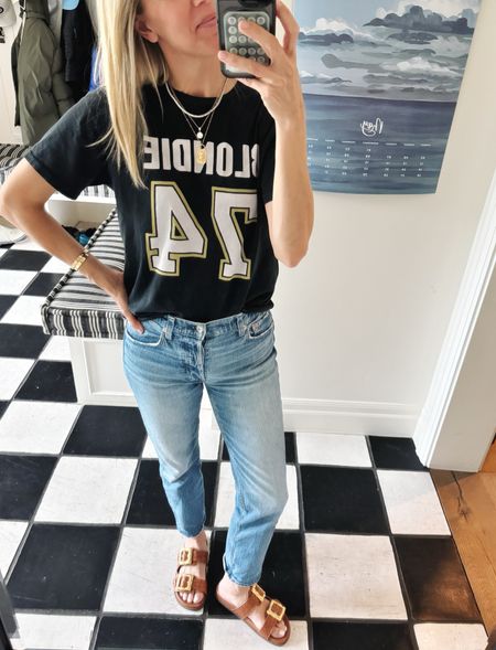 Outfit of the day:

Blondie graphic tee, our favorite cheeky jeans and a new sandal we’re loving.

T-shirt runs TTS and Gretchen is wearing a small.

Schutz sandal 

#LTKShoeCrush #LTKOver40 #LTKStyleTip
