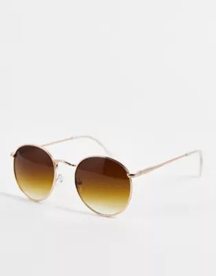 ASOS DESIGN metal round sunglasses in gold with brown lens | ASOS (Global)